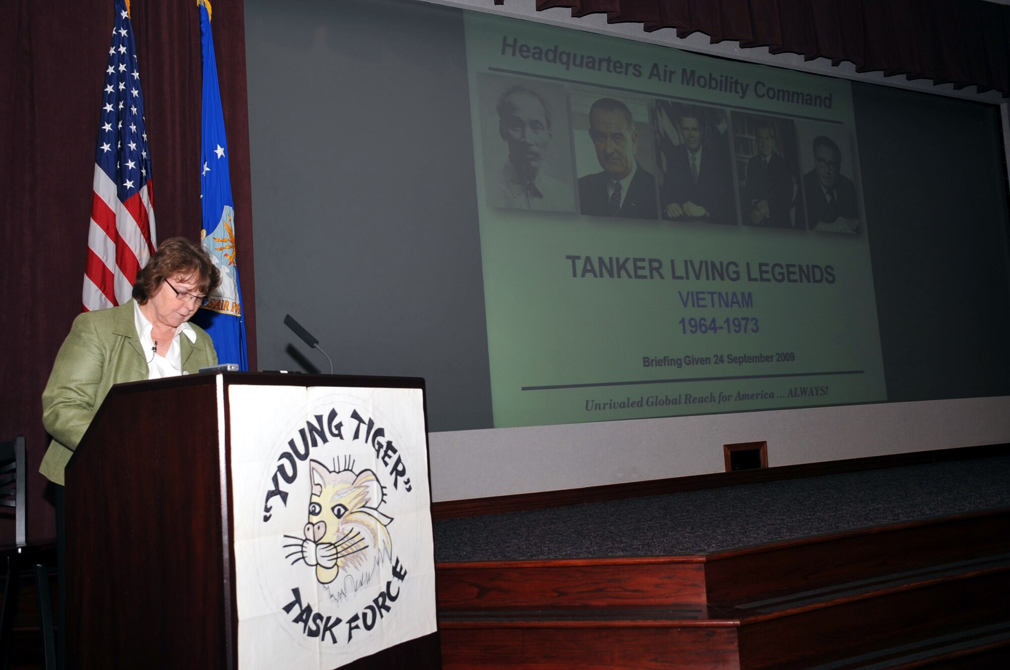 Ms. Gail Wojtowicz, Air Mobility Command Headquarters director of staff, narrates the opening of the Air Mobility Command Tanker "Living Legends" Speaker Series event on the Vietnam War in the Global Reach Planning Center at Scott Air Force Base, Ill., on Sept. 24, 2009.  The purpose of the speaker series is to commemorate 80 years of air refueling history.  (U.S. Air Force Photo/Tech. Sgt. Scott T. Sturkol)