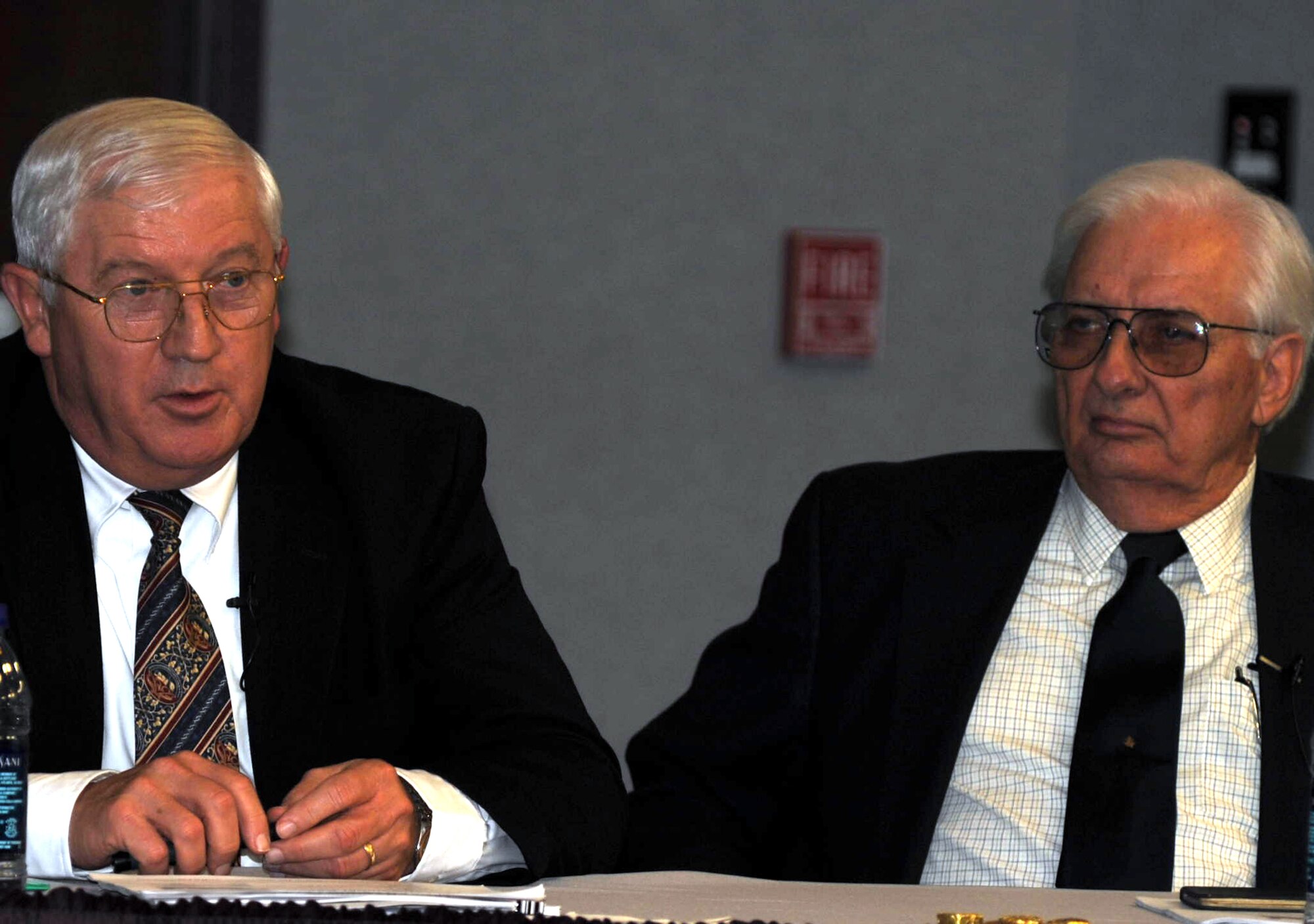 Retired Col. Bob Dawson (left) talks about his experiences as a tanker pilot during the Vietnam War as part of the Air Mobility Command Tanker "Living Legends" Speaker Series in the Global Reach Planning Center at Scott Air Force Base, Ill., on Sept. 24, 2009.  Also pictured is retired Maj. Donald Burgett -- a former KC-97 and KC-135 navigator who also served during the Vietnam War.  Colonel Dawson was involved in five back-to-back deployments to Southest Asia to support Operations Young Tiger and Arc Light between 1971 and 1973.  (U.S. Air Force Photo/Tech. Sgt. Scott T. Sturkol)