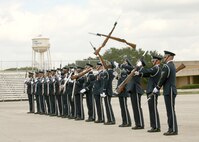 The Air Force Honor Guard Drill Team performs Sept. 18 at the Air Force Basic Military Training Reception Center at Lackland Air Force Base, Texas. The Drill Team is the traveling component inspiring Air Force awareness among military and civilian audiences by performing a complex drill routine. (U.S. Air Force photo/Robbin Cresswell)