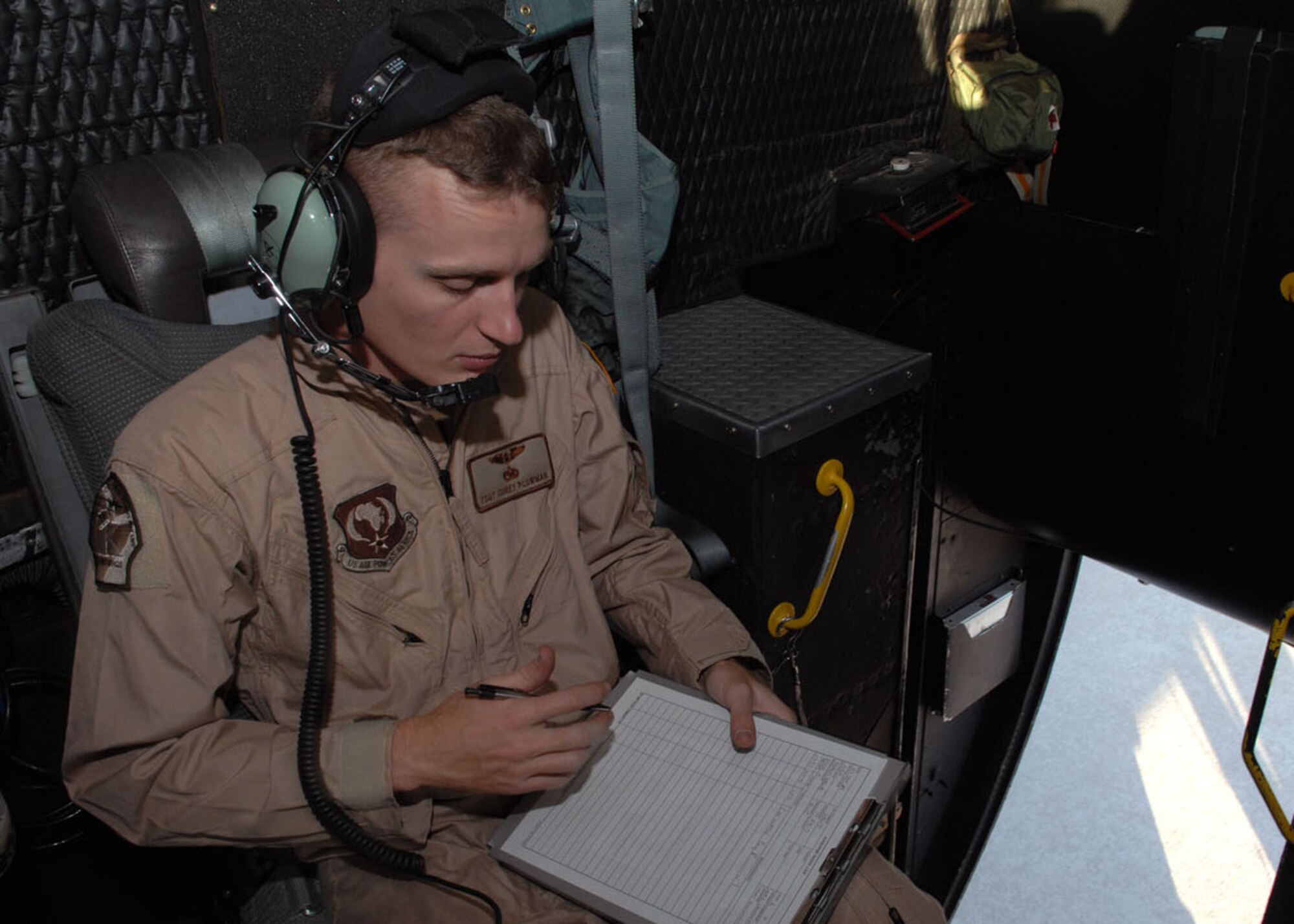 Tech. Sgt. Cory Plowman, 79th Rescue Squadron, prepares to depart Davis-Monthan Air Force Base Sept. 23 on an HC-130P headed to the Horn of Africa. The 79th Rescue Squadron will support U.S. Africa Command with various personnel recovery operations. (U.S. Air Force photo/Airman Jerilyn Quintanilla)