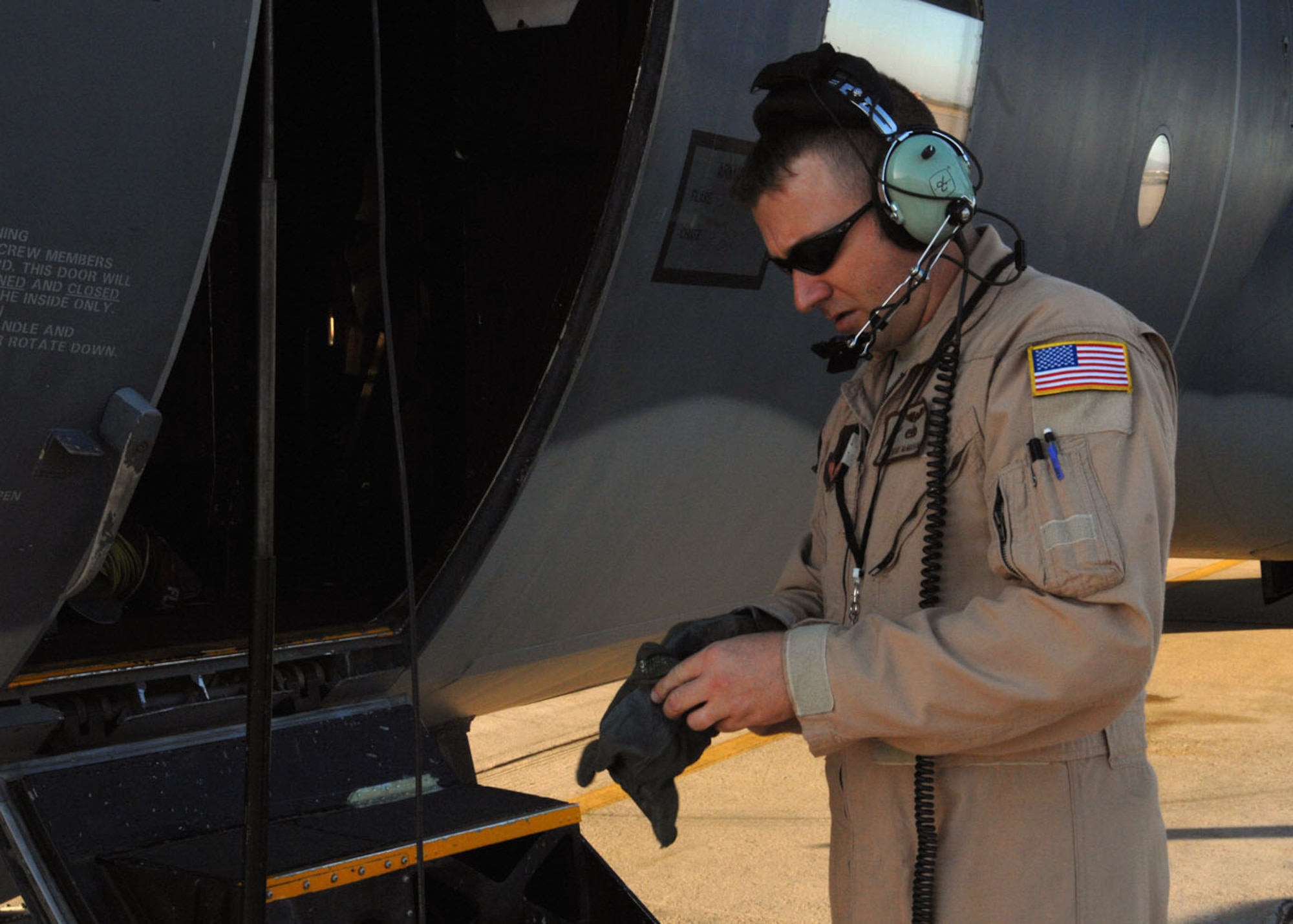 Staff Sgt. Jeremy McMahan, 79th Rescue Squadron, prepares to board the HC-130P aircraft Sept. 23. Sergeant McMahan, along with a team of six rescue squadron personnel, left Davis-Monthan Air Force Base to support U.S. Africa Command with personnel recovery operations. (U.S. Air Force photo/Airman Jerilyn Quintanilla)