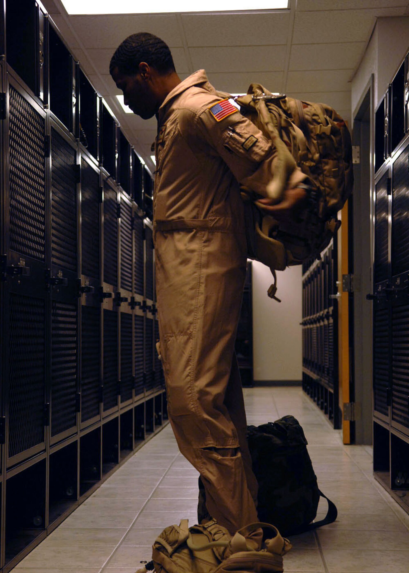 Staff Sgt. David Wheeler, 79th Rescue Squadron, packs his deployment gear Sept. 23. Sergeant Wheeler was one of 14 rescue squadron personnel to deploy to the Horn of Africa. The 79th Rescue Squadron will support U.S. Africa Command with various personnel recovery operations.  (U.S. Air Force photo/Airman Jerilyn Quintanilla)