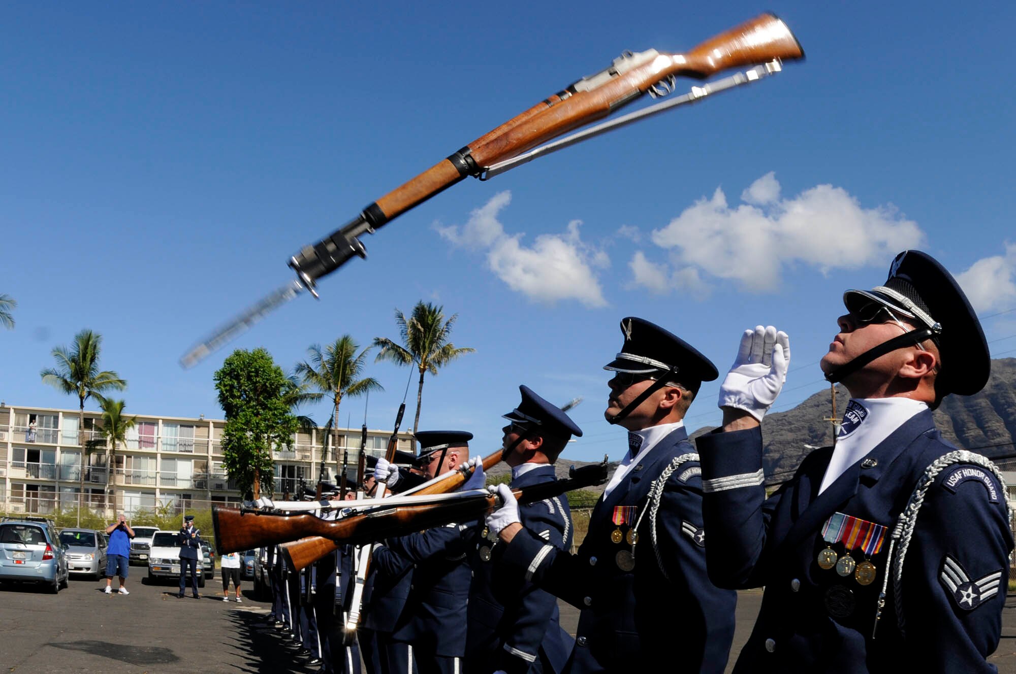 Senior Airman Aaron Fowler and members of the U.S. Air Force Honor Guard Drill Team perform for students at Wai’anae High School Sept .22 in Wai’anae, Hawaii. The Drill Team is the traveling component of the U.S. Air Force Honor Guard and tours worldwide representing all Airmen while showcasing Air Force precision and professionalism. (U.S. Air Force photo by Staff Sgt. Dan DeCook)