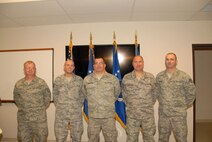 Technical Sgt. Mark Raut, Technical Sgt. Steven Sobus, Master Sgt. Dan Olmstead, 174FW MQ-9 Ground Control Station maintenance instructor, Technical Sgt. William Clochessy and Staff Sgt. Shawn Badman pose for a class photo on the 24th of September as part of the first graduating class of the Ground Control Station maintenance course held here at Hancock Field Air National Guard Base. (U. S. Air Force photo by Staff Sgt. Barbara Olney/RELEASED)