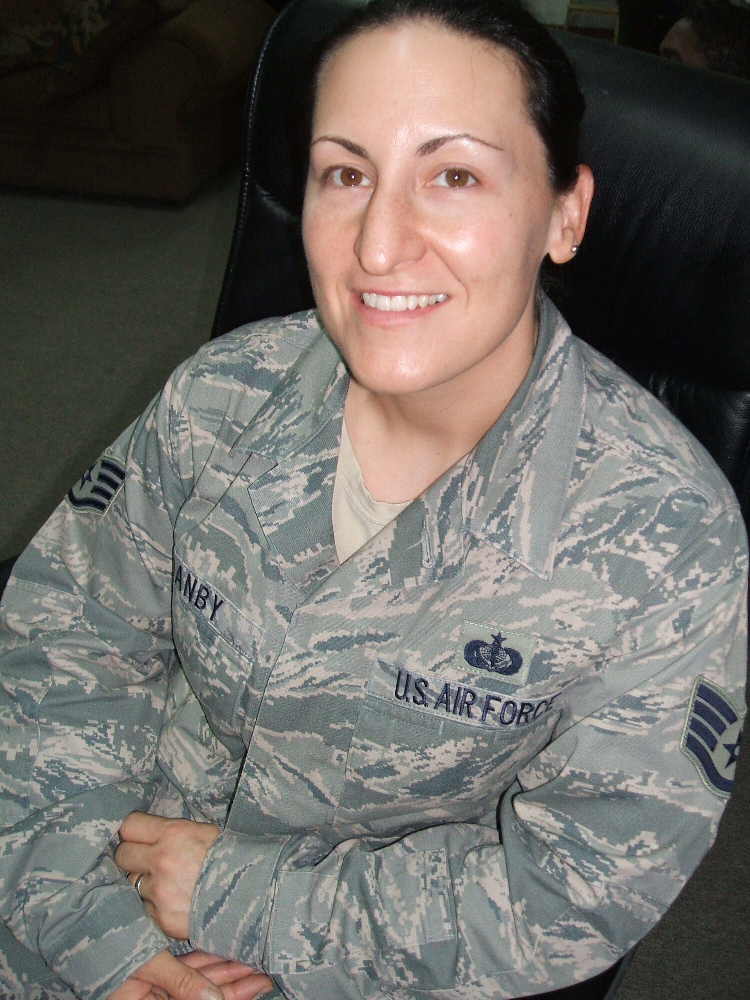 SOUTHWEST ASIA - Staff Sgt. Dawn Hanby, 380th Expeditionary  Force Support Squadron lodging representative, identifies her personal goal as, “Taking CLEP exams for four classes in pursuit of a bachelor’s of science in business finance, and two degrees through the Community College of the Air Force." Sergeant t Hanby is a reservist from the 162nd Fighter Wing in Tucson, Ariz. The city is also her hometown. (U.S. Air Force Photo/2nd Lt. Kidron B. Vestal)