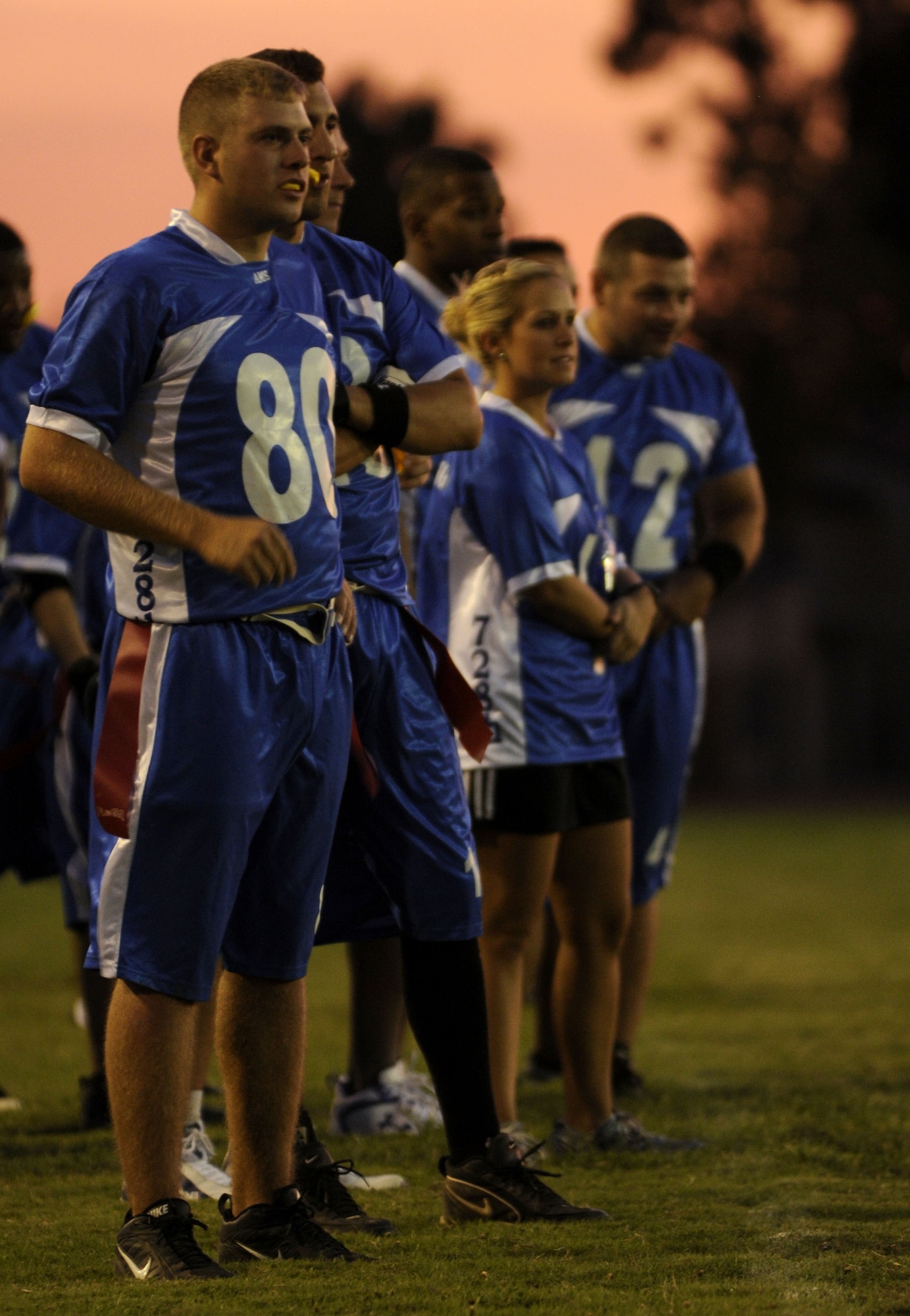 Airmen from the 728th Air Mobility Squadron watch from the sideline as their teammate run a play Wednesday, Sept. 23, 2009, during an intramural flag football game at Incirlik Air Base, Turkey. There are eight squadrons competing in this year’s season with seven scheduled games before the playoffs. (U.S. Air Force photo/Airman 1st Class Amber Ashcraft)