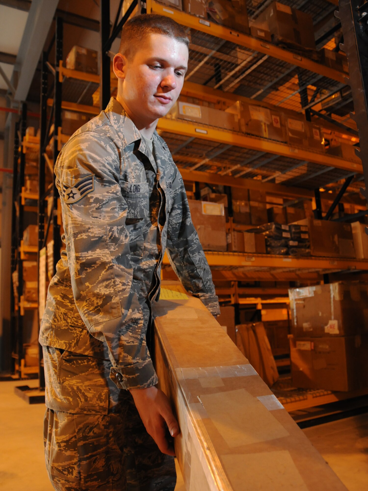 Senior Airman Dustin Long, 379th Expeditionary Logistics Readiness Squadron consolidated aircraft parts store technician, prepares a supply order here, Sept. 23. The consolidated aircraft parts store provides around-the-clock support to airframes and maintains more than 9,000 critical aircraft assets. Airman Long is deployed from Fairchild Air Force Base, Wash. in support of Operations Iraqi and Enduring Freedom. (U.S. Air Force Photo/Tech. Sgt. Jason W. Edwards)