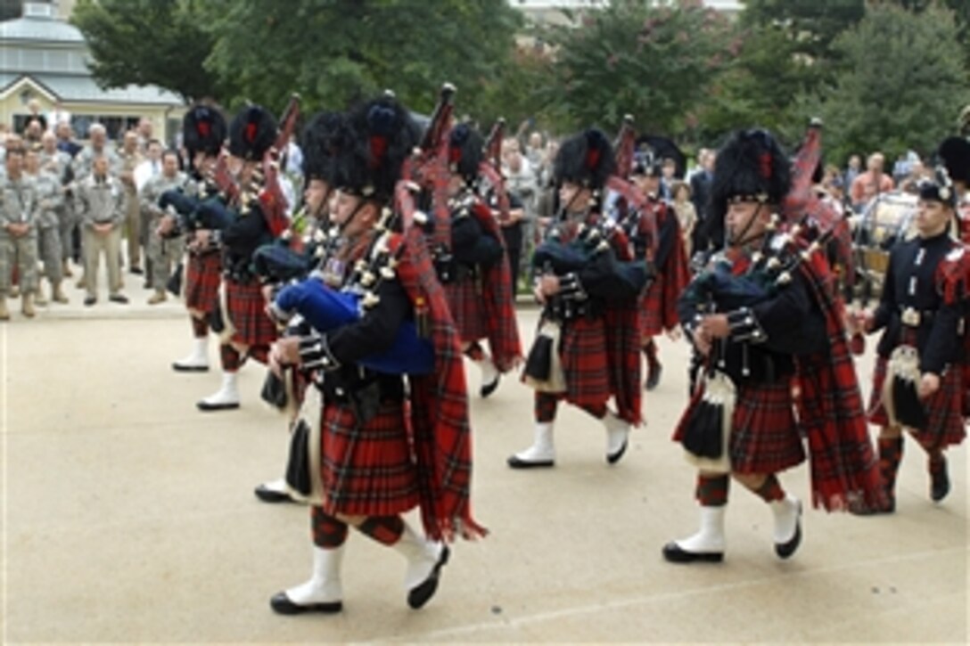 The Pipes and Drums of the 1st Battalion Scots Guard performs for employees, troops and families at the Pentagon, Sept. 25, 2009. The band, which features infantry soldiers, performed to express admiration for its closest allies before they deploy to Helmand province, Afghanistan,  early next year.