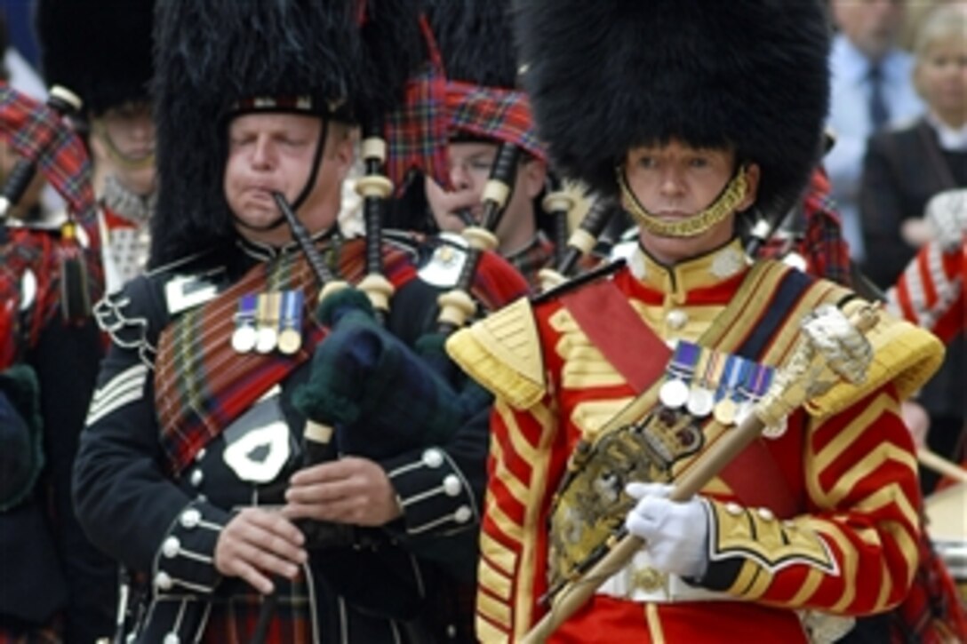 U.S. Army Sgt. Martin Godsman leads the Pipes and Drums of the 1st Battalion Scots Guard during a performance for employees, troops and families at the Pentagon, Sept. 25, 2009. The band, which features infantry soldiers, performed to express admiration for its closet allies before they deploy to Helmand province early next year.