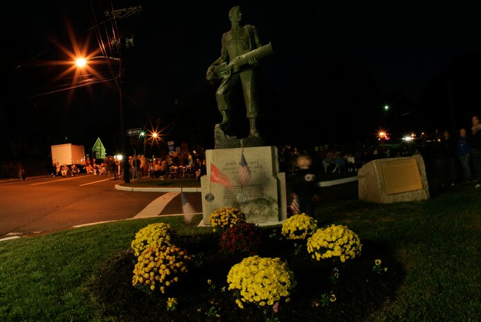 A crowd gathers in Raritan, N.J., at the John Basilone Statue for a concert and fireworks, Sept. 26. The hometown of the Medal of Honor and Navy Cross recipient has been honoring his legacy with a weekend celebration for 28 years. (Marine Corps photo by Sgt. Randall A. Clinton)