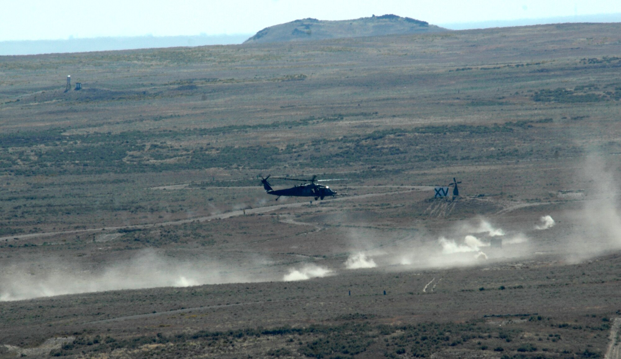 An HH-60 Pave Hawk from 34th Weapons Squadron, United States Weapons School Nellis Air Force Base, Nev. fires on targets over the Orchard Training Ranges, Idaho on Sept. 16, 2009 during the terminal employment phase of the Nellis Weapons School syllabus. The "T.E." mission objective is to demonstrate and instruct HH-60 weapons employment and landing zone options to maximize weapons effectiveness and quickly recover survivors. 

(U.S. Air Force photo/ Master Sgt. Kevin J. Gruenwald) released





 





















  












 











































  












 

























