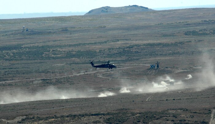 An HH-60 Pave Hawk from 34th Weapons Squadron, United States Weapons School Nellis Air Force Base, Nev. fires on targets over the Orchard Training Ranges, Idaho on Sept. 16, 2009 during the terminal employment phase of the Nellis Weapons School syllabus. The "T.E." mission objective is to demonstrate and instruct HH-60 weapons employment and landing zone options to maximize weapons effectiveness and quickly recover survivors. 

(U.S. Air Force photo/ Master Sgt. Kevin J. Gruenwald) released





 





















  












 











































  












 

























