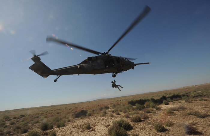 An Army soldier from the Utah Army National Guard, 19th Special Forces Group is hoisted into an HH-60 Pave Hawk from 34th Weapons Squadron, United States Air Force Weapons School, Nellis Air Force Base, Nev. during training at Orchard Training Ranges, Idaho on Sept. 16, 2009. The 34th Weapons Squadron is conducting the terminal employment phase of the Nellis Weapons School syllabus. The "T.E." mission objective is to demonstrate and instruct HH-60 weapons employment and landing zone options to maximize weapons effectiveness and quickly recover survivors. 

(U.S. Air Force photo/ Master Sgt. Kevin J. Gruenwald) released




 





















  












 











































  












 

























