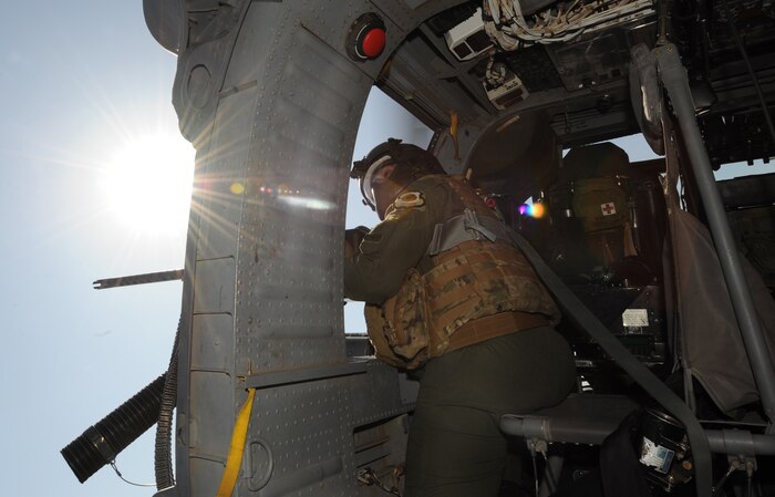 Tech. Sgt. Michael Vincent, flight engineer, 34th Weapons Squadron, United States Air Force Weapons School, Nellis Air Force Base, Nev. tracks targets with a  .50 caliber machine gun over Orchard Training Ranges, Idaho on Sept. 16, 2009 during the terminal employment phase of the Nellis Weapons School syllabus. The "T.E." mission objective is to demonstrate and instruct HH-60 weapons employment and landing zone options to maximize weapons effectiveness and quickly recover survivors. 

(U.S. Air Force photo/ Master Sgt. Kevin J. Gruenwald) released




 





















  












 











































  












 

























