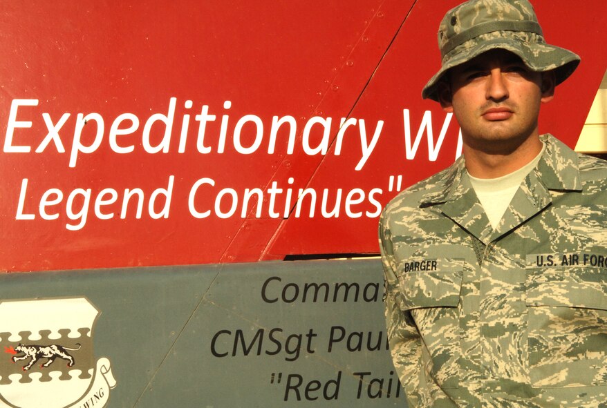 JOINT BASE BALAD, Iraq – Staff Sgt. Justin Barger, 332nd Expeditionary Operations Support Squadron air traffic control craftsman, is the 332nd Air Expeditionary Wing's Tuskegee Airman of the Week for Sept. 13-19. One of Sergeant Barger’s distinctive accomplishments was coordinating the response to a recent aircraft accident and expediting the medical response to 12 injured personnel. (U.S. Air Force photo/Senior Airman Andria J. Allmond)
