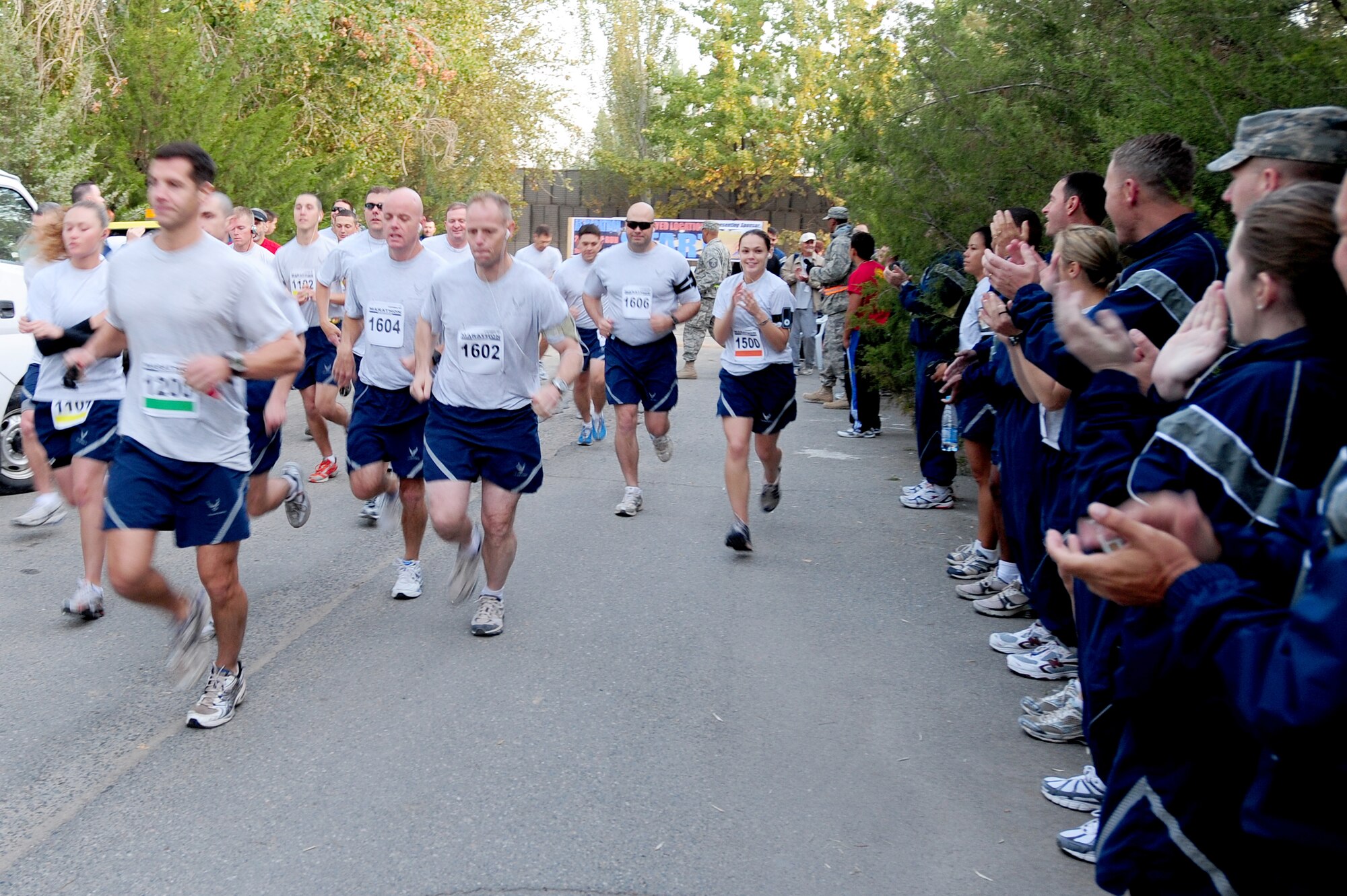 TRANSIT CENTER AT MANAS, Kyrgyzstan -- Runners begin their race against the clock at the Manas Marathon on Sept. 19, 2009. Several participants journeyed through the trek of 26.2 miles individually while other runners paired with fellow Airmen as teams. (U.S. Air Force photo/Senior Airman Steele C. G. Britton)