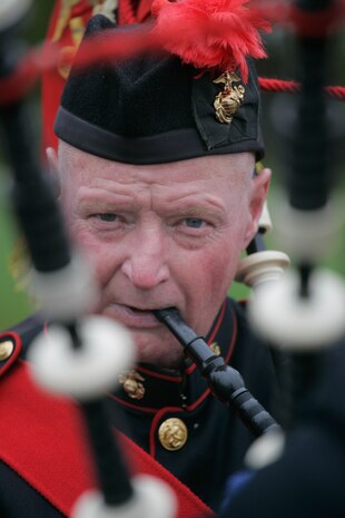 Joe Murphy, Leatherneck Pipe and Drums, warms up before the John Basilone Parade in Raritan, N.J., Sept 27. The parade is the largest military parade in the nation and honors Basilone, a native of the town, who received a Medal of Honor and Navy Cross for actions in Guadalcanal and Iwo Jima. (Marine Corps photo by Sgt. Randall A. Clinton)
