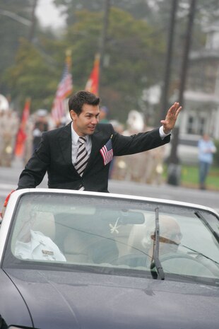 Actor Jon Seda waves from the motorcade leading the John Basilone Parade in Raritan, N.J., Sept. 27. Seda will play John Basilone, a native Marine Medal of Honor and Navy Cross recipient, in the upcoming HBO miniseries "The Pacific."(Marine Corps photo by Sgt. Randall A. Clinton)