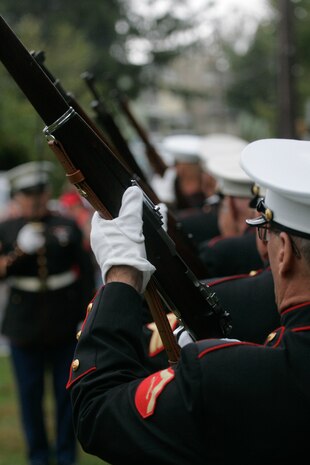 A firing detail prepares to give a three-volley shot salute in honor of GySgt. John Basilone in Raritan, N.J., Sept 27. The celebration of the town's Medal of Honor recipient is the largest in the nation. (Marine Corps photo by Sgt. Randall A. Clinton)