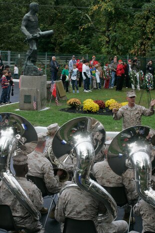 The Quantico Marine Corps Band performs during the wreath laying ceremony at the John Basilone Statue in Raritan, N.J., Sept. 27. The celebration of the town's Medal of Honor recipient is the largest in the nation. (Marine Corps photo by Sgt. Randall A. Clinton)