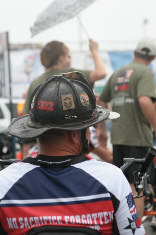 Wounded warrior at the start of the 8th Annual Tunnel-To-Towers Run in New York City Sept. 27, 2009.  The run commemorates Firefighter Stephen Siller, New York City Fire Department, who ran 3.1 miles through the tunnel connecting Brooklyn and Manhattan Sept. 11, 2001, carrying 70 lbs. of gear to assist at the World Trade Center before dying in the towers' collapse.  Despite a steady rain, approximately 25,000 runners took part in the event.