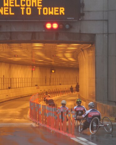 Wounded warriors enter the Brooklyn Battery Tunnel connecting Brooklyn with lower Manhattan during the 8th Annual Tunnel-To-Towers Run in New York City Sept. 27, 2009.  The run commemorates Firefighter Stephen Siller, New York City Fire Department, who ran 3.1 miles through the tunnel connecting Brooklyn and Manhattan Sept. 11, 2001, carrying 70 lbs. of gear to assist at the World Trade Center before dying in the towers' collapse.  Despite a steady rain, approximately 25,000 runners took part in the event.