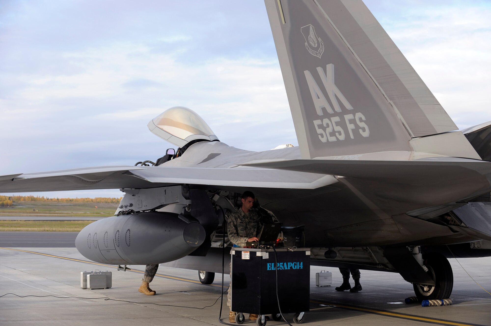 ELMENDORF AIR FORCE BASE, Alaska -- Members of the 525th Aircraft Maintenance Unit recover an F-22 Raptor that just landed here after a long flight from Andersen Air Force Base, Guam. The aircraft, crew members and maintainers were deployed to Andersen AFB for four months. This was the squadron's first deployment since being activated under the 3rd Wing nearly two years ago. (U.S. Air Force photo/Master Sgt. Keith Brown)