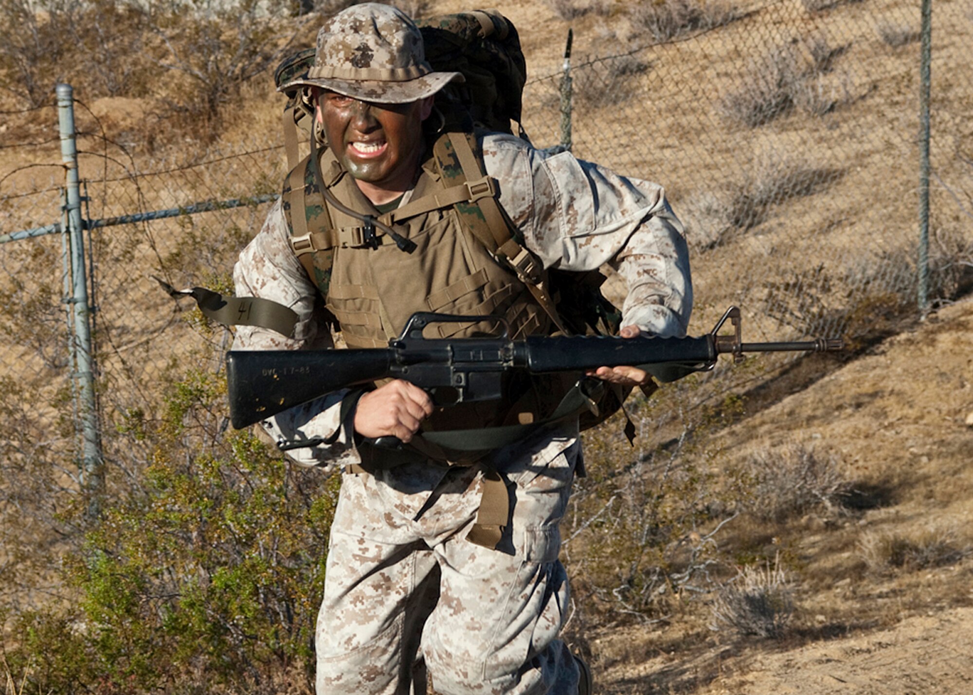 An Edwards Marine from Marine Aircraft Group 46 Detachment Bravo takes part in the base's 6-mile ruck march Sept. 17. The ruck march kicked off Team Edwards POW/MIA observance. (Air Force photo Mike Yncera) 