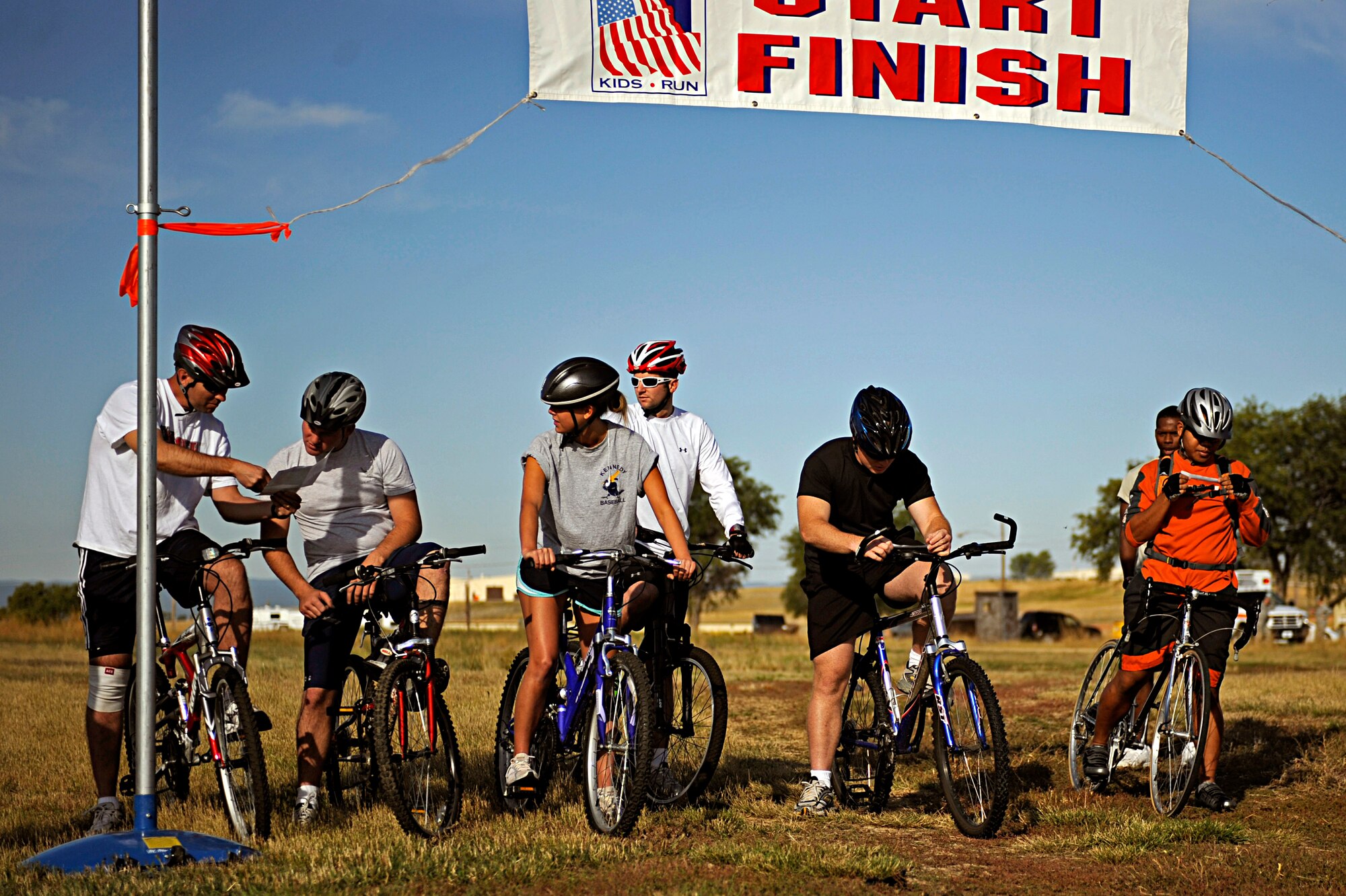Competitors of the Raider Challenge begin by interpreting clues to where the next checkpoint is here, Sept. 25. The challenge consisted of a bike ride, run and canoe race. (U.S. Air Force photo/Airman 1st Class Matthew Flynn)