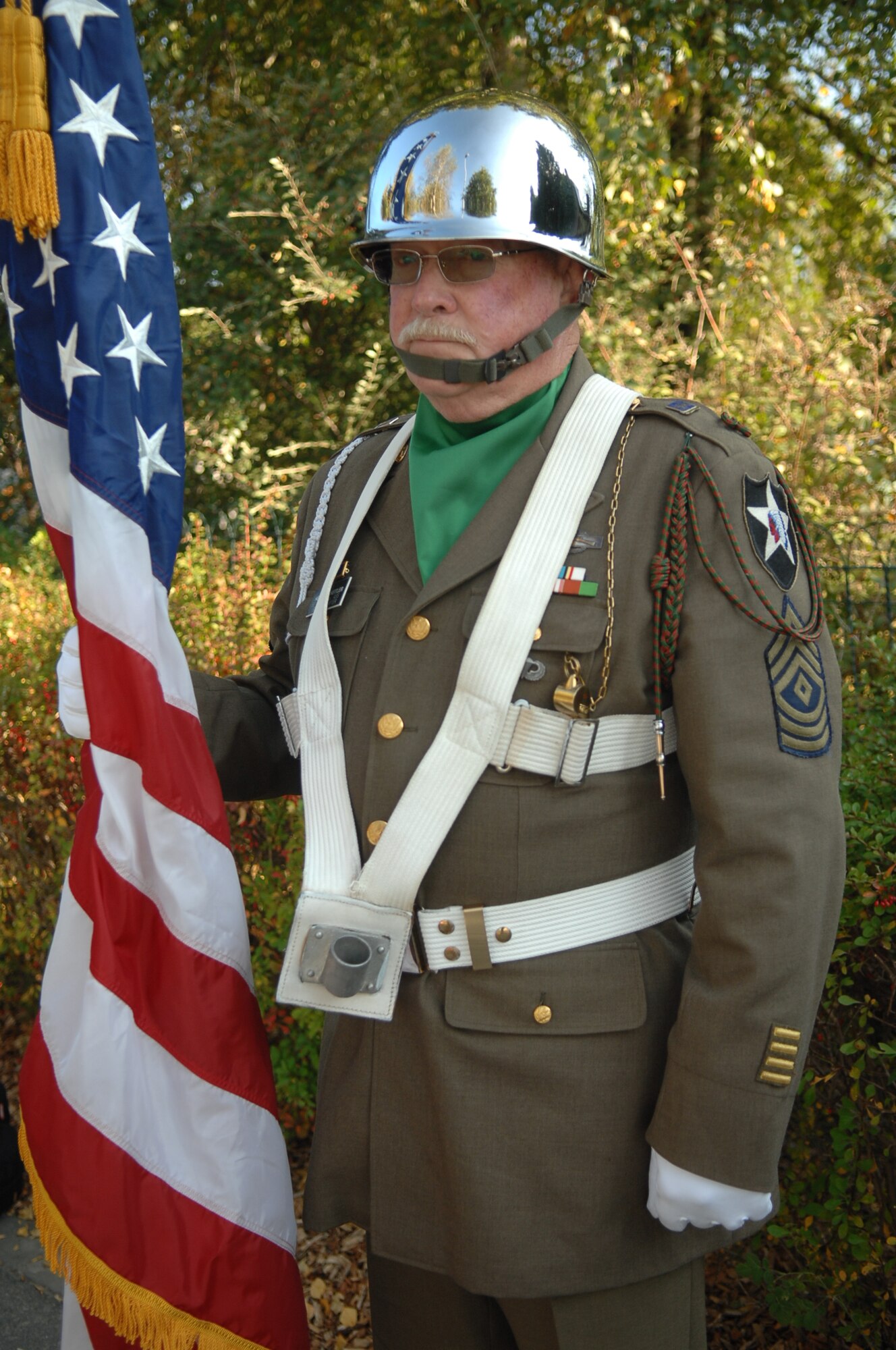 SPANGDAHLEM AIR BASE, Germany -- Sgt. Henry Scheitler, retired World War II servicemember from the 83rd Road Infantry Division, stands at attention during the World War II Battle of the Bulge Commemoration in Boulaide, Luxembourg, Sept. 26.   The event took place to honor the 65th Anniversary of the Liberation of Luxembourg. The mayor and town unveiled a monument with a plaque for a B-17 that crashed there during the Battle of the Bulge. (U.S. Air Force photo/ Airman 1st Class Nick Wilson)