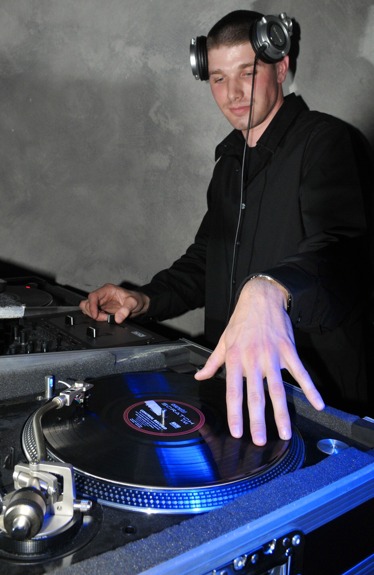 SPANGDAHLEM AIR BASE Germany -- Club Eifel disc jockey DJ Blaze plays music at the 2009 Air Force Ball here at Club Eifel Sept. 25. Sabers from across the 52nd Fighter Wing were invited to attend the event, which observed the Air Force's birthday and Airmen's contributions around the globe.  This year's theme was "All in...Globally Engaged" to recognize the unique role the Air Force fulfills in missions across the world. (U.S. Air Force photo/Airman 1st Class Nick Wilson)
