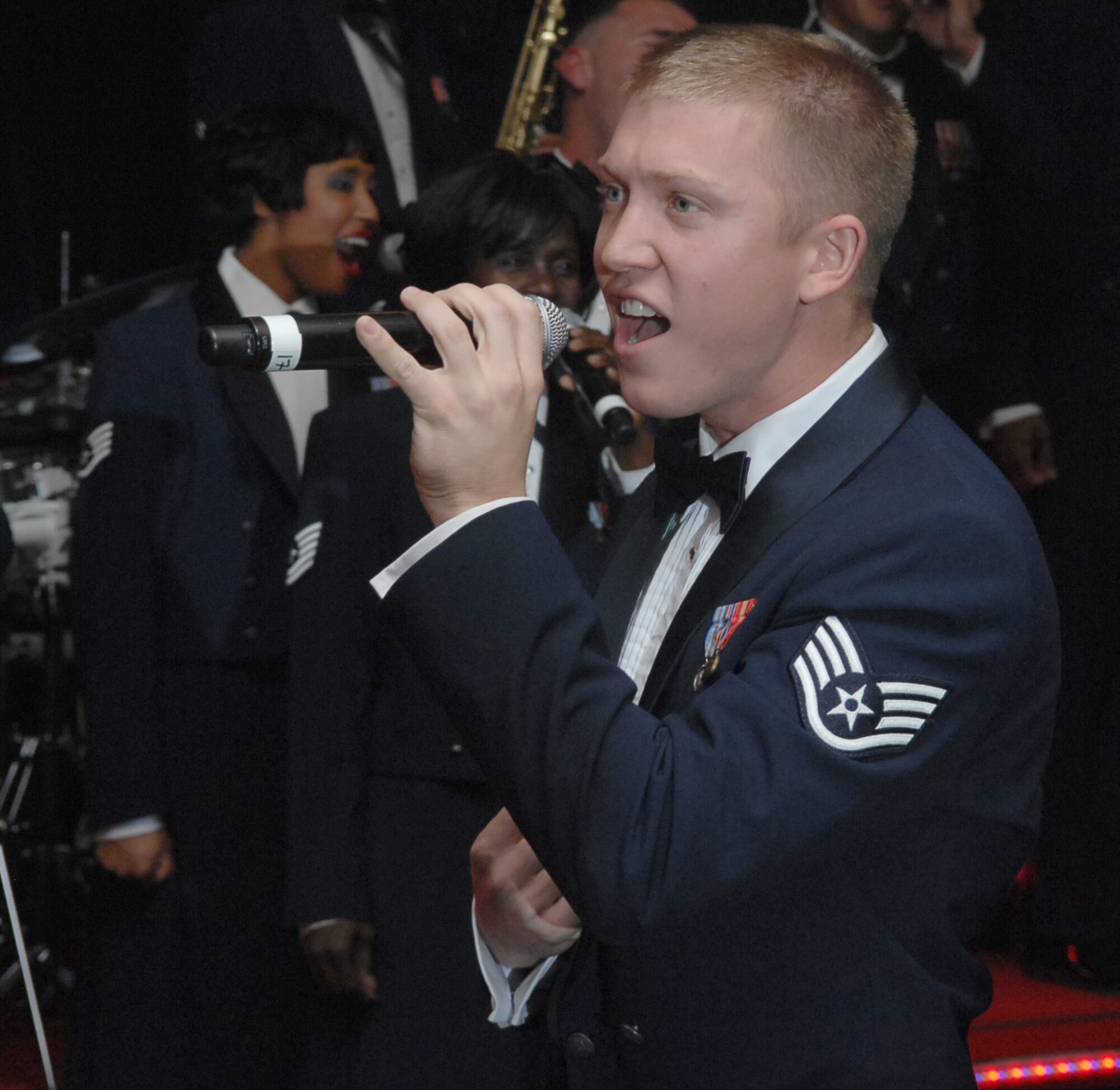 SPANGDAHLEM AIR BASE Germany -- Tops in Blue member Staff Sgt. Zabric Bryce performs a solo at the 2009 Air Force Ball here at Club Eifel Sept. 25. Sabers from across the 52nd Fighter Wing were invited to attend the event, which observed the Air Force's birthday and Airmen's contributions around the globe.  This year's theme was "All in...Globally Engaged" to recognize the unique role the Air Force fulfills in missions across the world. (U.S. Air Force photo/Airman 1st Class Nick Wilson)