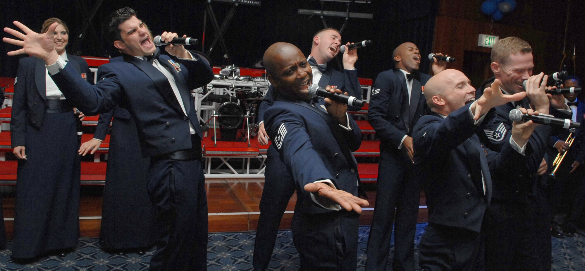 SPANGDAHLEM AIR BASE Germany -- Members of Tops in Blue perform at the 2009 Air Force Ball here at Club Eifel Sept. 25. Sabers from across the 52nd Fighter Wing were invited to attend the event, which observed the Air Force's birthday and Airmen's contributions around the globe.  This year's theme was "All in...Globally Engaged" to recognize the unique role the Air Force fulfills in missions across the world. (U.S. Air Force photo/Airman 1st Class Nick Wilson)