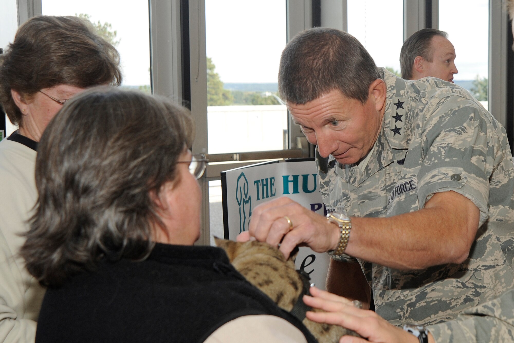 Air Force Academy superintendent Lt. Gen. Mike Gould visits representatives from the Humane Society of the Pikes Peak Region during the Combined Federal Campaign kickoff at the Academy Sept. 22, 2009. The Humane Society was one of about 40 CFC charities in attendance at the kickoff event. (U.S. Air Force photo/Rachel Boettcher)