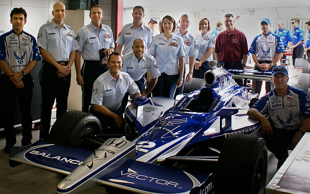 Members of Pacific Trends take an opportunity to meet the Air Force Indy Team before their performance during the opening ceremony at Indy Japan 300, in Motegi Japan.  (Photo taken by SMSgt Mike Goetz).  