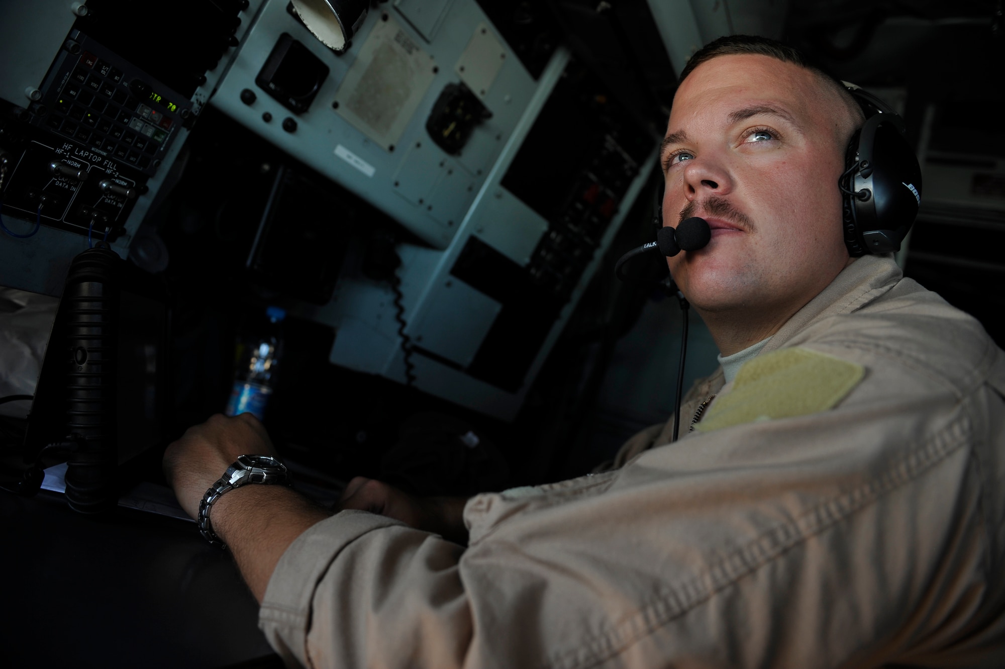 U.S. Air Force Master Sgt. Nathan Neidhardt, 340th Expeditionary Air Refueling Squadron boom operator,deployed to a base in Southwest Asia looks towards the pilot during the pre-take off check here Sept. 25.  The KC-135 Stratotanker will refuel various aircraft over Afghanistan in support Operation Enduring Freedom. (US Air Force photo by Staff Sgt. Angelita Lawrence)(released)