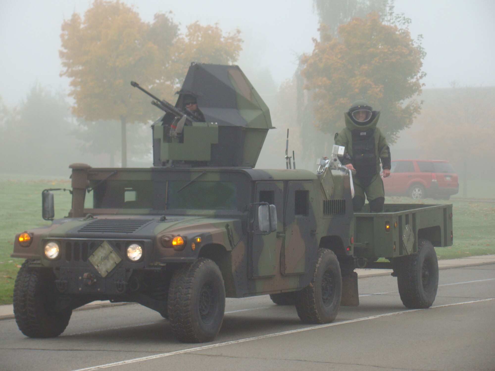 SPANGDAHLEM AIR BASE, Germany – An explosive ordnance disposal truck moves along during a foggy parade that was part of 2008 National Fire Prevention Week activities here. The 2009 Fire Prevention Week will include school visits by Saber firefighters and Sparky, the National Fire Protection Association mascot, as well as a parade at 11 a.m. Oct. 10 starting at the Eifel Lanes Bowling Center, through housing and ending at Spangdahlem Elementary School. (Courtesy photo)