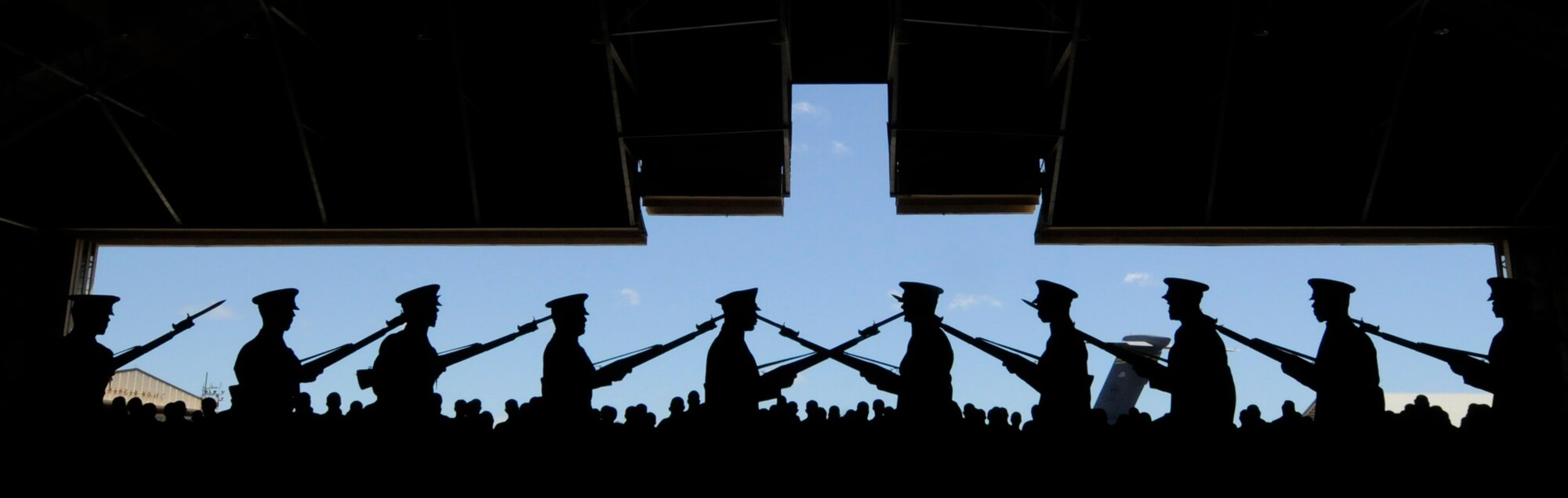 Members of the Air Force Honor Guard Drill Team perform in an open hangar Sept. 25 at Hickam Air Force Base, Hawaii. The Drill Team is the traveling component of the U.S. Air Force Honor Guard and tours worldwide representing all Airmen while showcasing Air Force precision and professionalism. (U.S. Air Force photo by Staff Sgt. Dan DeCook)