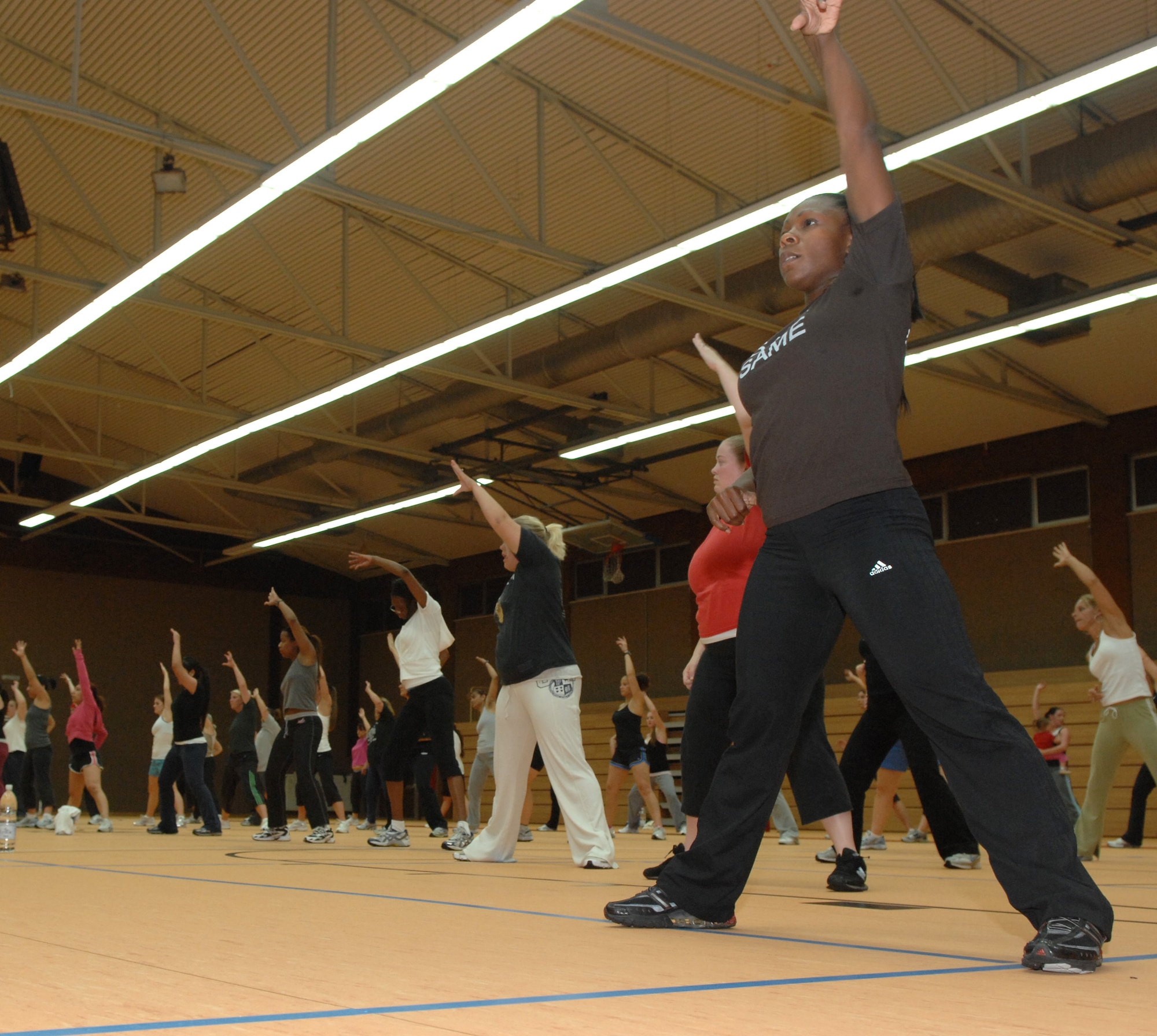 SPANGDAHLEM AIR BASE, Germany – Sabers participate in a rarely-offered Zumba class Sept. 25. Zumba incorporates dance and fitness, allowing its users to burn between 700 to 800 calories an hour. The class may be offered more frequently to sabers in the future. (U.S. Air Force photo/Airman 1st Class Staci Miller)