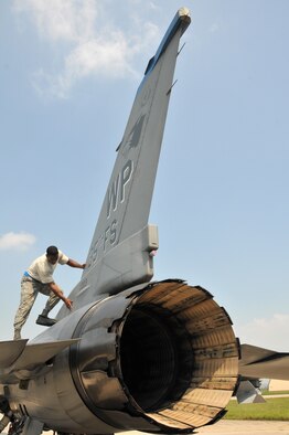 Staff Sgt. Erik Bedenfield, a crewchief with the 8th Aircraft Maintenance Squadron, 35th Aircraft Maintenance Unit, checks the panels as he performs a post flight inspection on an F-16 Fighting Falcon at Kunsan Air Base, Republic of Korea, Sept. 17. The 35th AMU maintainers inspected about 12 F-16s before the pilots deployed the jets to Eielson Air Force Base, Alaska, for Distant Frontier and Red Flag Alaska. (U.S. Air Force photo/Capt. Shannon Collins)
