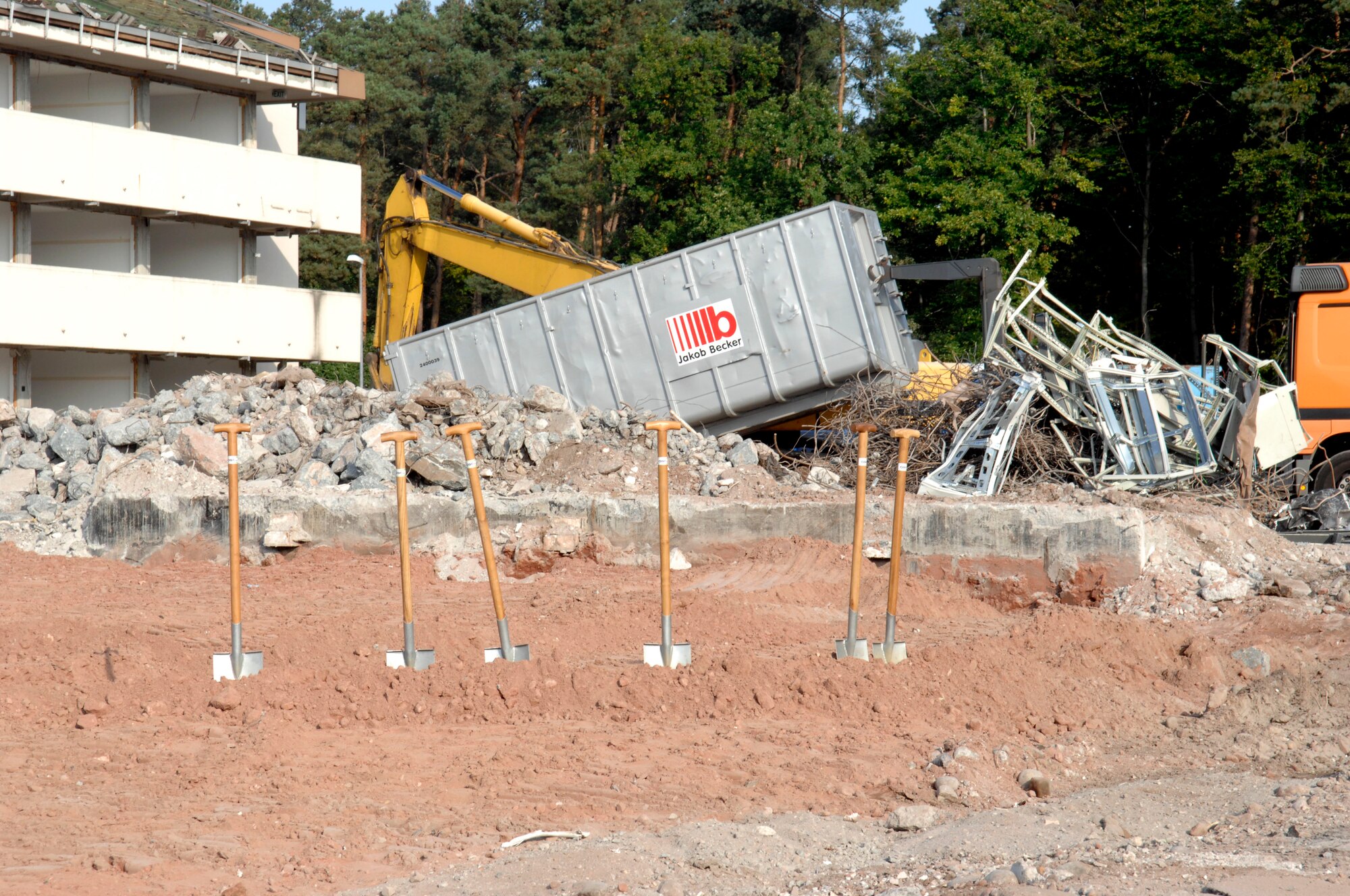 Shovels are placed in preparation for the dormitory ground breaking ceremony on Ramstein Air Base, Germany, Sept. 25, 2009. The design for the new dormitory will provide a four-person module with individual bedrooms, private baths, a shared kitchen with awasher and dryer and a common living room. (U.S. Air Force photo by Airman 1st Class Brittany Perry)