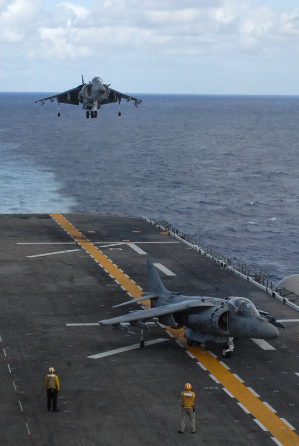Pilots from the Yuma-based Marine Attack Squadron 513 land AV-8B Harriers on the deck of the USS Bonhomme Richard afloat in the Pacific Ocean Sept. 28, 2009. A detachment from VMA-513 joined the 11th Marine Expeditionary Unit for an estimated six-month deployment in the western Pacific. The ship set sail from San Diego Sept. 24, 2009, six days later than expected due to repairs. Members of VMA-513 are also serving with the 31st Marine Expeditionary Unit, currently providing humanitarian assistance in the Philippines after a deadly tropical storm struck the region.