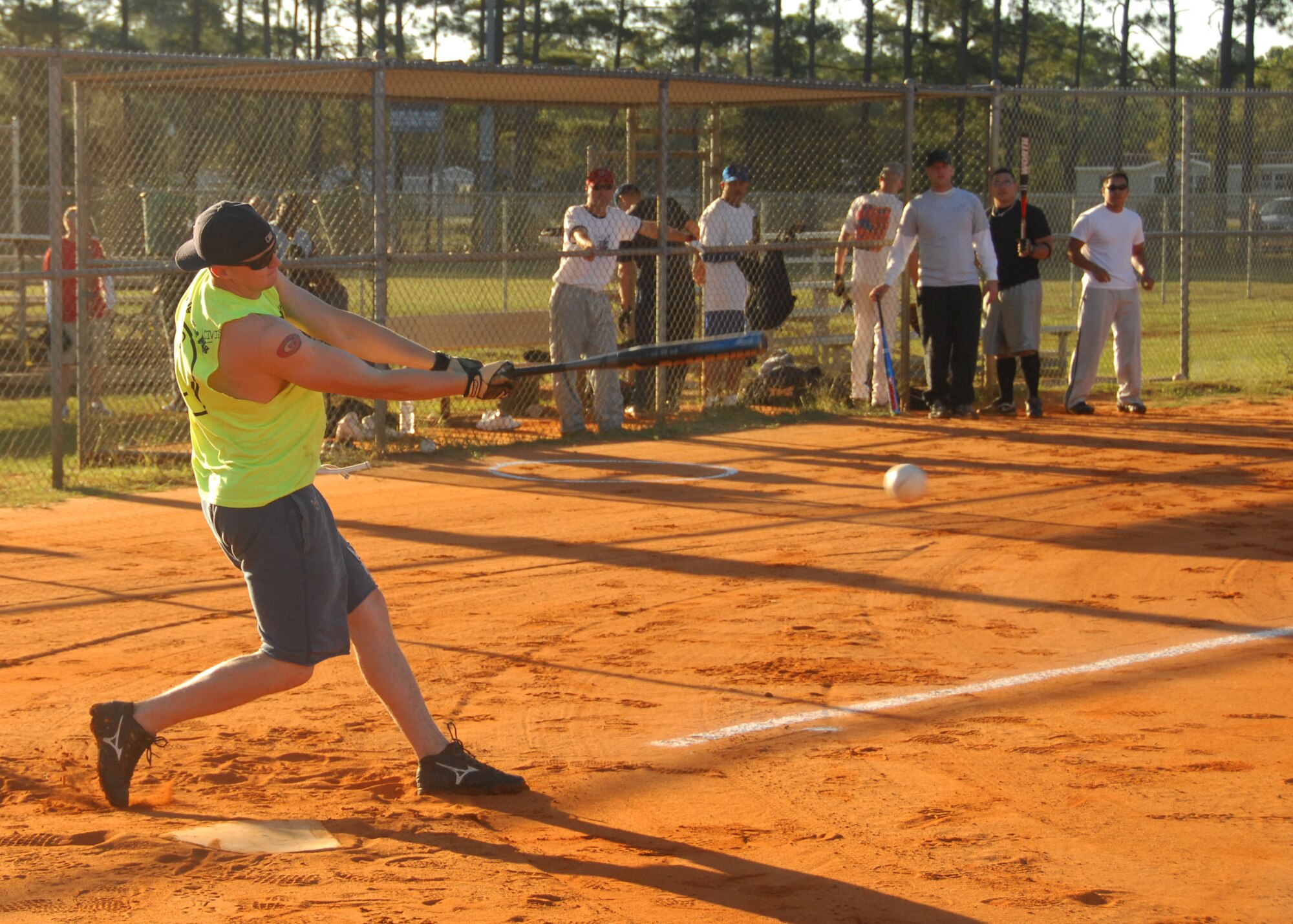 SHAW AIR FORCE BASE, S.C. -- Senior Airman Robert Ryan, 20th Aircraft Maintenance Squadron avionics specialist, drives the softball during a Viper Challenge softball game Sept. 29. The Viper Challenge is a day of athletics and competition between Team Shaw units. (U.S. Air Force photo/2nd Lt. Emily Chilson)
