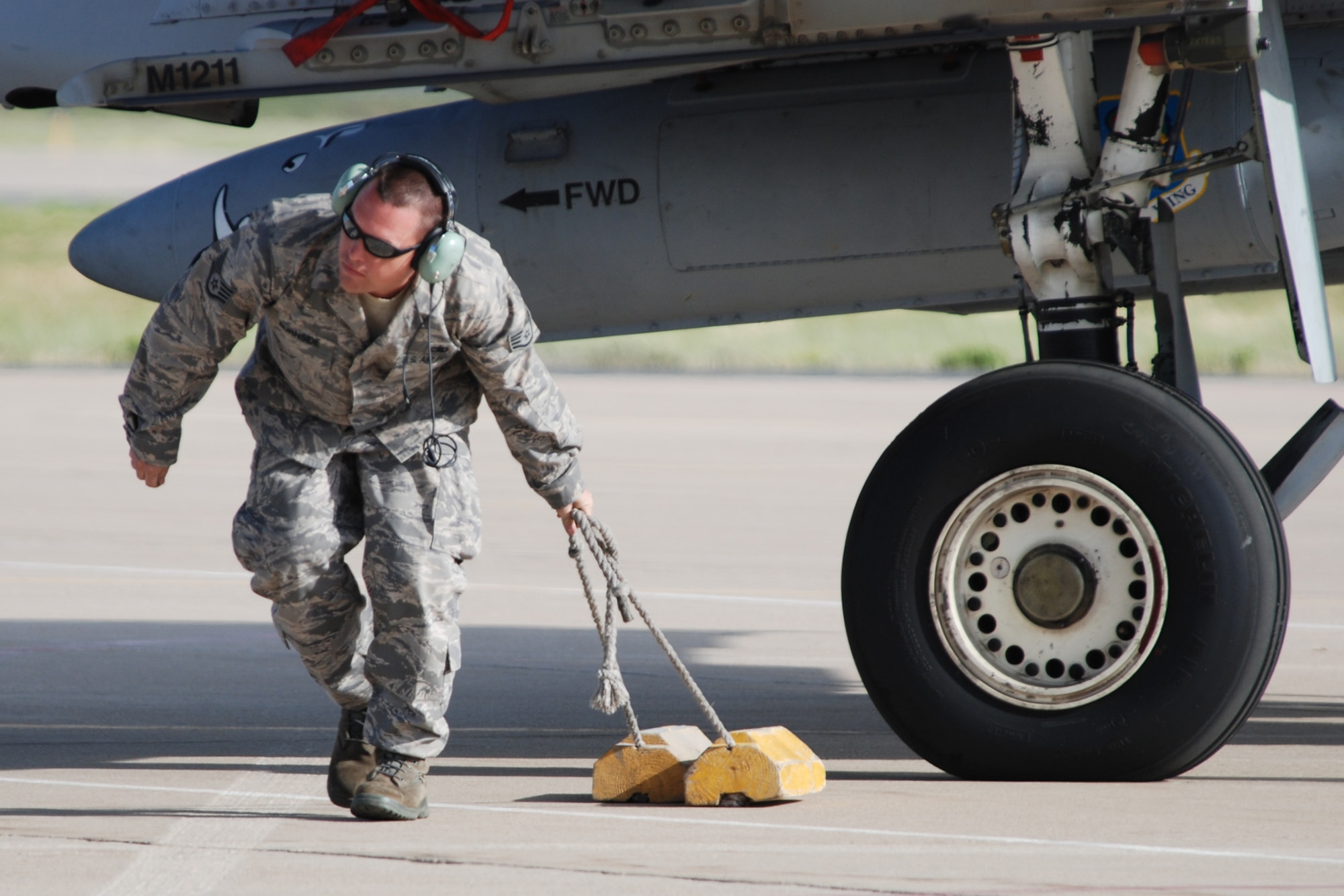 Staff Sgt. Tim Burnside, engine mechanic, 717th Maintenance Squadron pulls chocks on a 47th Fighter Squadron A-10 Thunderbolt II aircraft prior to a sortie in support of Patriot Rifle III, Hill Air Force Base, Utah, on September 13, 2009. More than 54 members of the 917th Wing from Barksdale Air Force Base, La., and six aircraft participated in the exercise. (U.S. Air Force photo/Master Sgt. Greg Steele)

