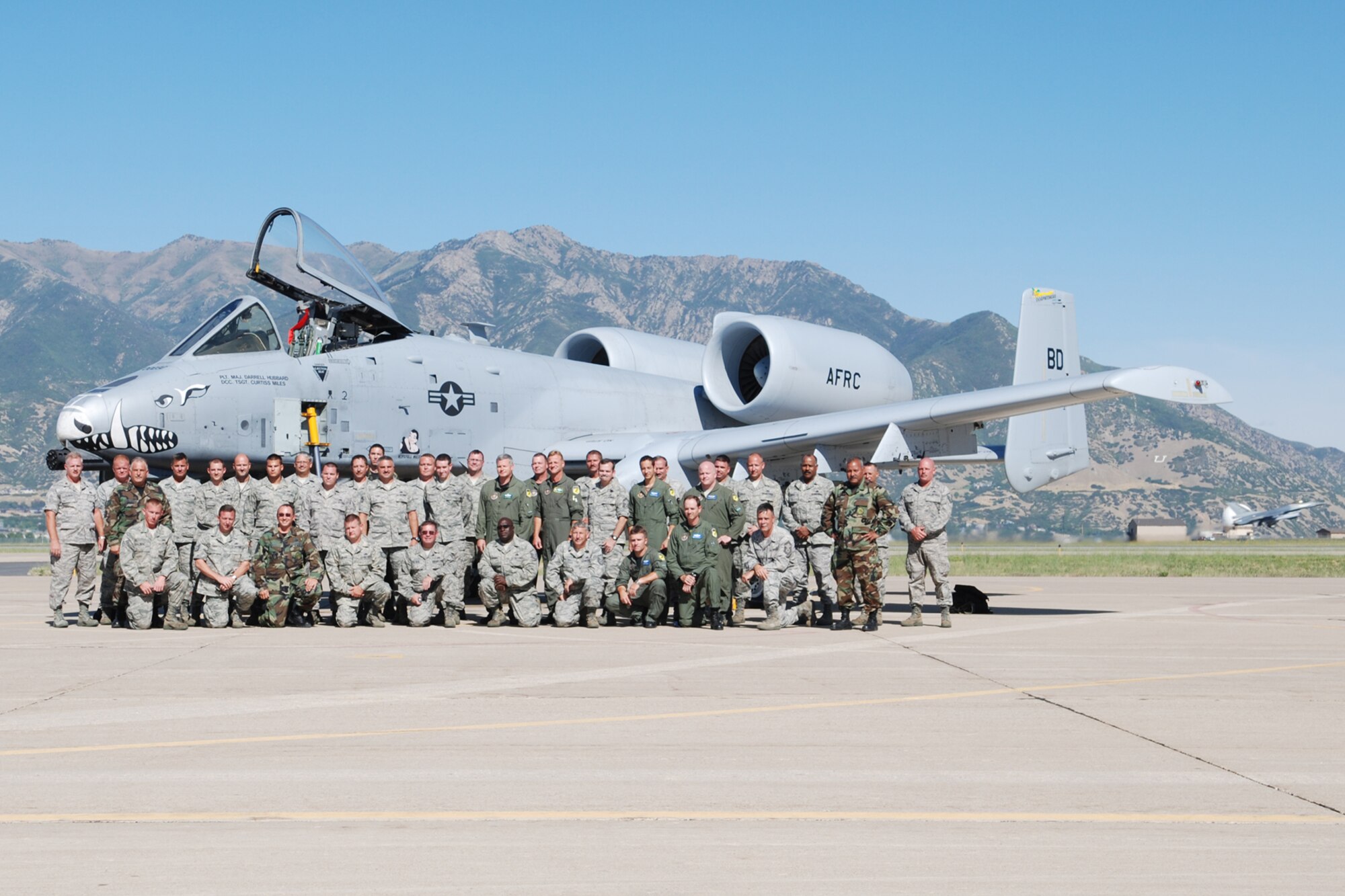 Pilots from the 47th Fighter Squadron and 717th Aircraft Maintenance Squadron personnel from Barksdale Air Force base, La., take time for a group photo in front of an A-10 Thunderbolt II aircraft while supporting Patriot Rifle III, Hill Air Force Base, Utah, on September 12, 2009. More than 54 members of the 917th Wing from Barksdale, and six aircraft participated in the exercise.  (U.S. Air Force photo/Master Sgt. Greg Steele)

