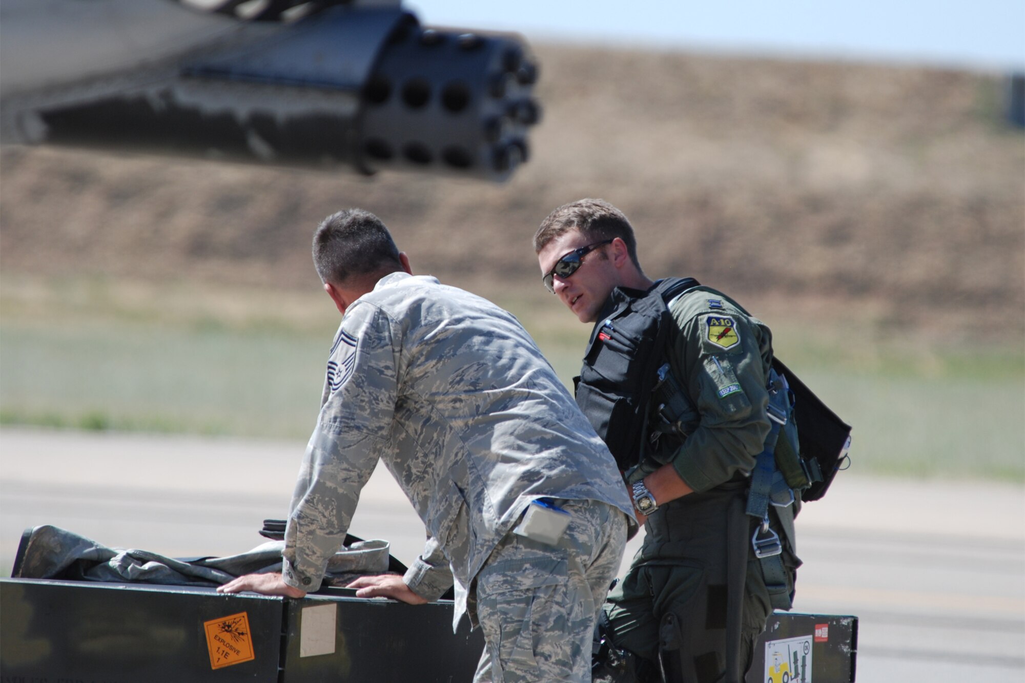 Capt. Jason Cobb, 47th Fighter Squadron, pilot, and Senior Master Sgt. Mike Thornton, 717th Aircraft Maintenance Squadron, production superintendent, discuss mission results following Captain Cobb’s return from a sortie in support of Patriot Rifle III, Hill Air Force Base, Utah, on September 12, 2009. More than 54 members of the 917th Wing from Barksdale Air Force Base, La., and six aircraft participated in the exercise. (U.S. Air Force photo/Master Sgt. Greg Steele) 