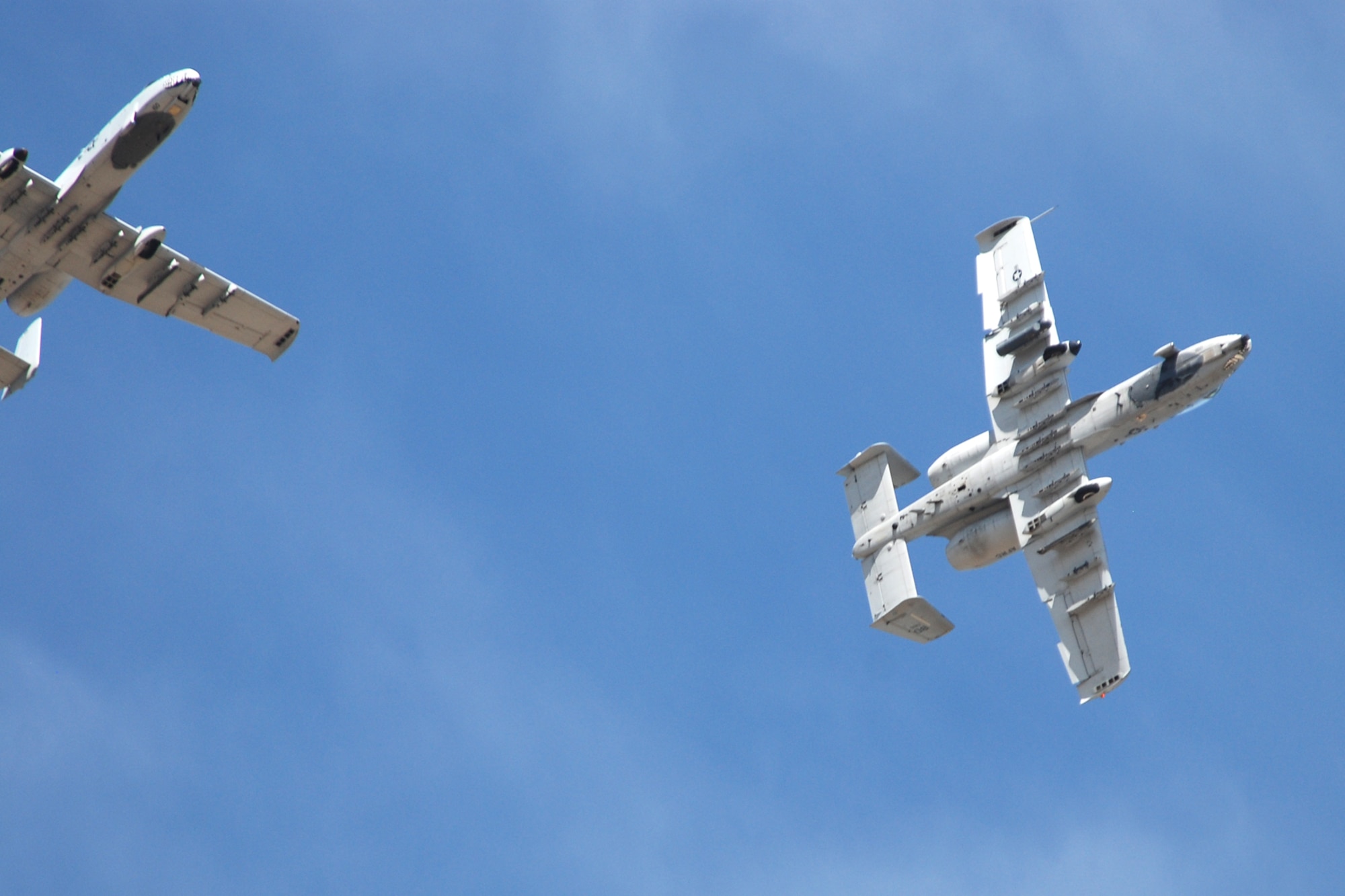 Two 47th Fighter Squadron A-10 Thunderbolt II aircraft return from a sortie at the Utah Test and Training Range in support of Patriot Rifle III, Hill Air Force Base, Utah, on September 12, 2009. More than 54 members of the 917th Wing from Barksdale Air Force Base, La., and six aircraft participated in the exercise. (U.S. Air Force photo/Master Sgt. Greg Steele)