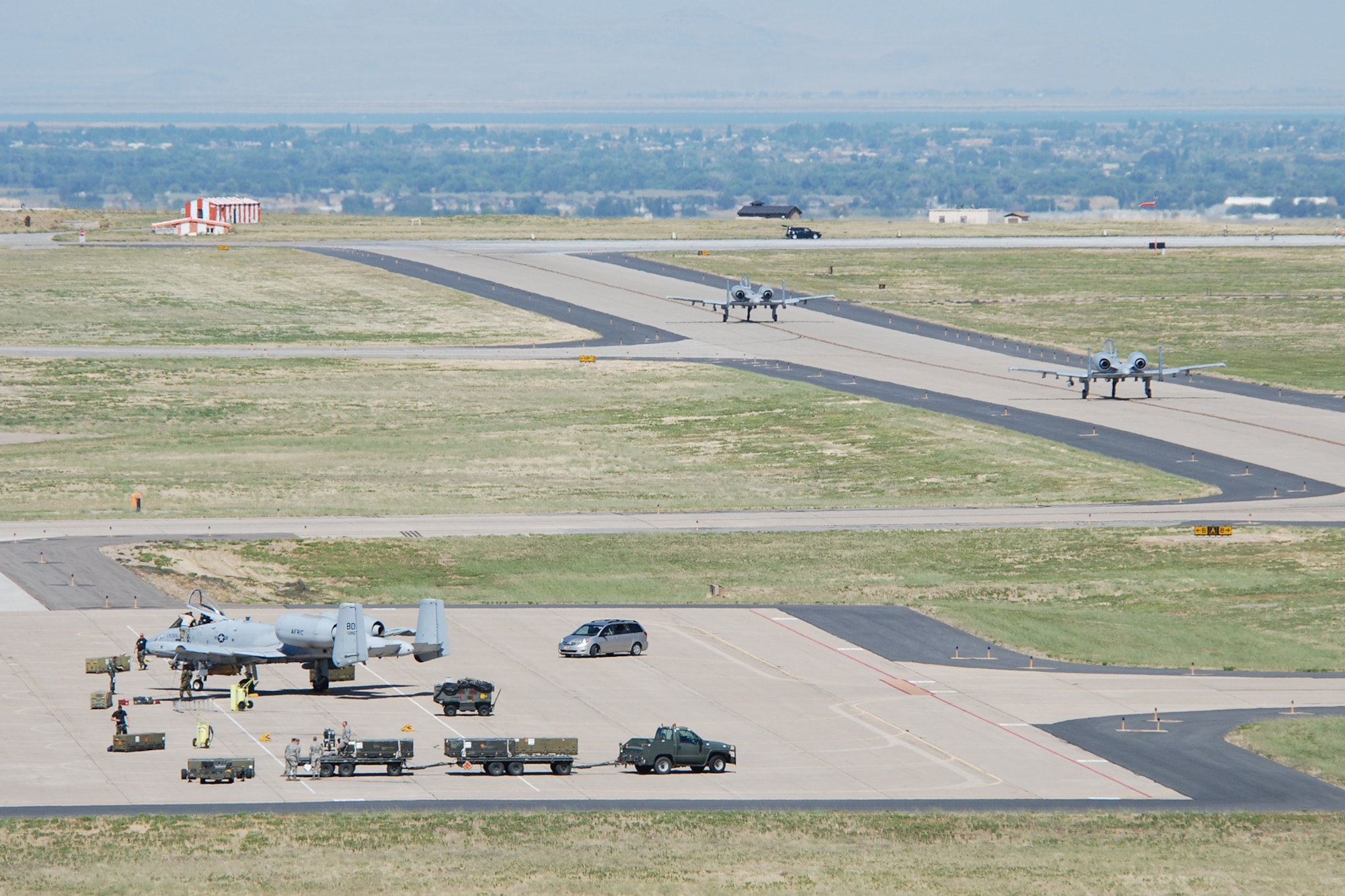 Two 47th Fighter Squadron A-10 Thunderbolt II aircraft taxi to the end-of-runway in preparation for takeoff to the Utah Test and Training Range in support of Patriot Rifle III, Hill Air Force Base, Utah, on September 12, 2009. More than 54 members of the 917th Wing from Barksdale Air Force Base, La., and six aircraft participated in the exercise. (U.S. Air Force photo/Master Sgt. Greg Steele)