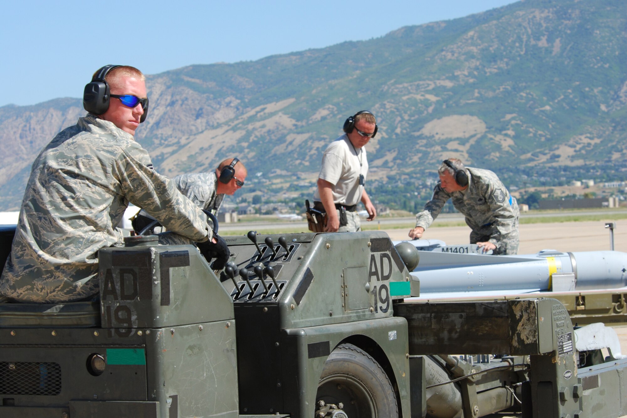 Senior Airman. Cody Burt, 717th Aircraft Maintenance Squadron weapons loader, operates a MHU-83 bomb lift truck to load an AGM-65 Maverick missile on a 47th Fighter Squadron A-10 Thunderbolt II aircraft in support of Patriot Rifle III, Hill Air Force Base, Utah, on September 12, 2009. More than 54 members of the 917th Wing from Barksdale Air Force Base, La., and six aircraft participated in the exercise. (U.S. Air Force photo/Master Sgt. Greg Steele)

