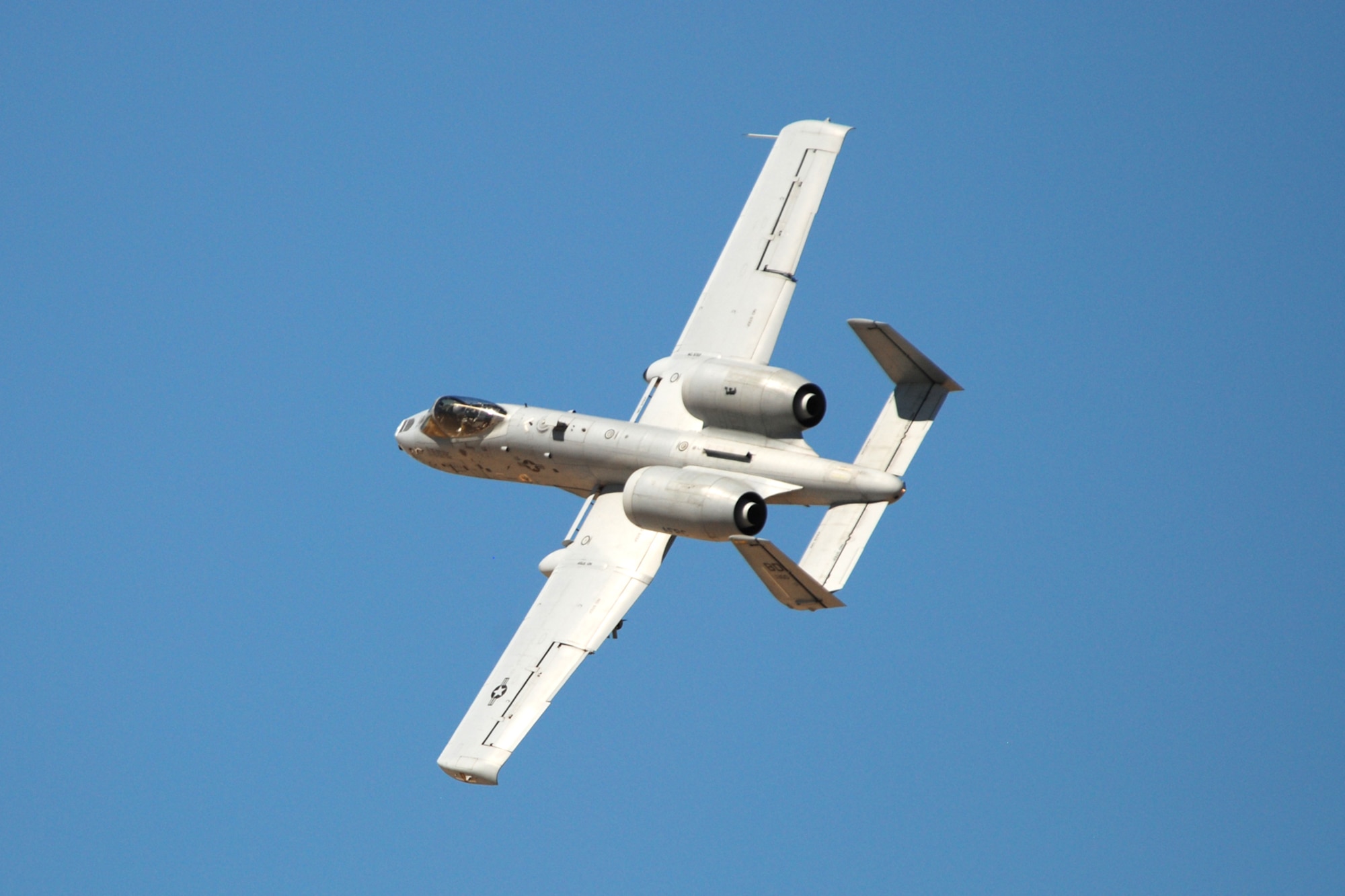 A 47th Fighter Squadron A-10 Thunderbolt II aircraft simulates a 30mm strafing attack on an enemy position at the Utah Test and Training Range in support of Patriot Rifle III, Hill Air Force Base, Utah, on September 11, 2009. More than 54 members of the 917th Wing from Barksdale Air Force Base, La., and six aircraft participated in the exercise. (U.S. Air Force photo/Master Sgt. Greg Steele)